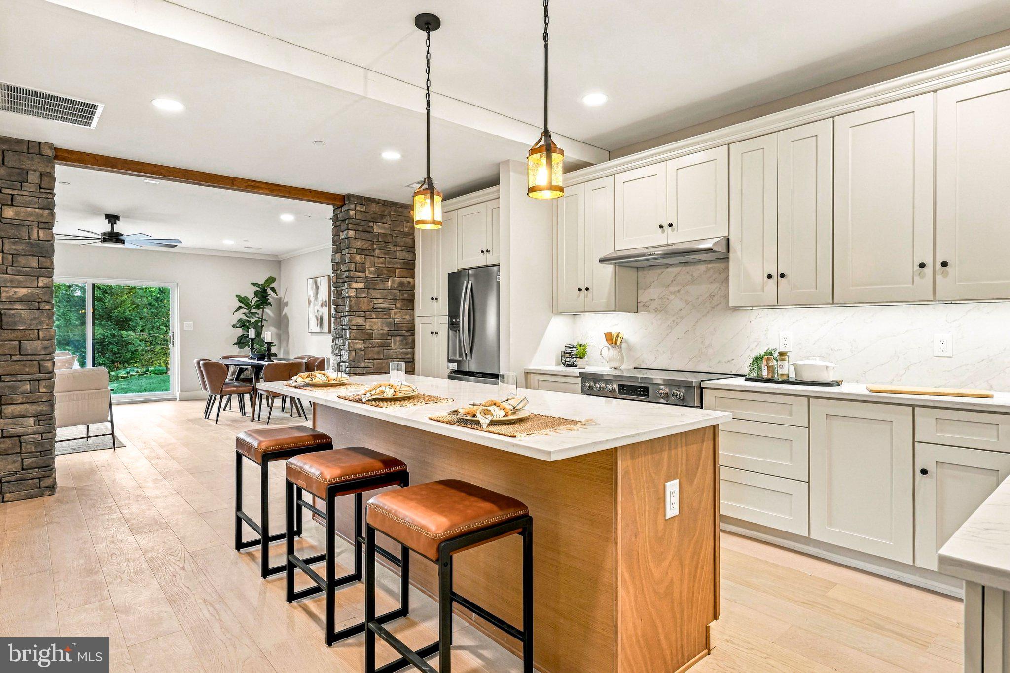 Introducing Greenridge Commons, a distinctive collection of twelve bespoke two-story residences thoughtfully created through the adaptive reuse of a historic local school in beautiful Glenmoore, within the award-winning Downingtown Area School District and highly regarded STEM Academy. Rather than starting with a blank slate, Greenridge Commons preserves the character, scale and substantial construction of the original building while transforming it into twelve sophisticated new residences with beautifully appointed, all-new interiors and inviting community green space. Anything but cookie-cutter, each home offers a thoughtful blend of modern design, individuality and historic character. Open-concept floor plans are filled with natural light and finished with high-quality materials and carefully considered details. Kitchens feature quartz countertops, beautiful cabinetry, oversized center islands, stainless steel appliances and distinctive stonework details that thoughtfully echo the character of the original building. Additional highlights include beautifully tiled baths, spacious walk-in closets, private balconies or patios, solar tube lighting and energy-efficient construction. Ten interior residences offer spacious open-concept living on the main level, with three bedrooms and convenient laundry on the second floor. Two larger carriage-home-style end residences offer an elevated sense of space and privacy, with additional windows, beautiful views, dedicated dining rooms and exceptionally spacious second-floor bedrooms. One end residence also offers the opportunity to create a first-floor primary suite. Inquire for additional details and available options.Southern-facing residences enjoy southern exposure, while homes on the northern side of the building offer north/northeastern exposure, creating a variety of natural-light orientations throughout the community. The building itself retains distinctive elements of its original construction, including substantial block walls thoughtfully incorporated into the exterior and complemented by stucco, along with a newer roof. The result is a rare combination of the scale, substance and character of an established building with the finishes, systems and functionality of a brand-new home. Greenridge Commons offers an intimate setting surrounded by mature greenery and open landscapes, with convenient access to shopping, dining, parks and major commuter routes. Residents will enjoy covered parking, community green space and a community room designed for gatherings and shared activities.Located just minutes from downtown Eagle, Marsh Creek State Park and Springton Manor Farm, Greenridge Commons offers the opportunity to enjoy a quiet suburban setting with easy access to the amenities of the surrounding area—all with the convenience of low-maintenance living.