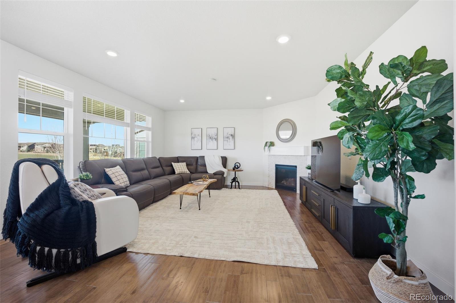 A VA Assumable loan offered at 3.499% buyer must qualify.Experience this beautiful residence within the impressive Blackstone Country Club Community, where privacy and sweeping golf course views define the lifestyle. This beautifully appointed 4-bedroom, 4-bathroom home showcases an elegant open-concept design, flooded with natural light and thoughtfully selected for both refined daily living and sophisticated entertaining.The greatest part of the home is the large gourmet kitchen, with generous counter space and seamless flow into the main living and dining areas. A stylish butler’s area leads to an oversized walk-in pantry, offering convenience and storage.A private home office is thoughtfully positioned at the front of the home, providing quiet separation from the formal dining area, kitchen, and main living space.The main-floor primary suite offers a serene retreat, complete with a spacious walk-in closet and a spa-inspired en-suite featuring dual vanities. Designed for comfort and privacy, this suite provides a luxurious escape at the end of the day.Upstairs, a generous loft adds flexible living space suitable for a secondary lounge, office, or play area. The upstairs laundry room is very convienientt offering built-in cabinetry and a utility sink.Step outside to the expansive covered deck and enjoy unobstructed views of Hole #4 of the golf course—perfect for enjoyable cookouts, or just enjoying your evening and watching the sunset. The walk-out basement offers limitless potential to create a customized retreat, whether a home theater, entertainment lounge with bar, wellness studio, or a complete living area for in-laws.The backyard enhances the home’s sense of tranquility and privacy while showcasing the surrounding natural beauty. With its thoughtful layout, premium finishes, and exceptional golf course setting, this home delivers a rare blend of luxury, comfort, and timeless appeal.WELCOME HOME!