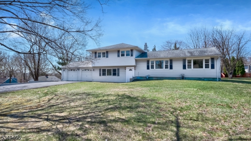 Welcome to 6 Golf Course Rd, Roxbury! Expect to be impressed in this Custom Expanded Split level completely renovated in move-in condition! Spacious 4 bedrooms, 3 full baths with over $100K recent updates.  Ground floor features an in-law suite with a bedroom, full bath, living room and separate entrance.  Main level has new kitchen, bathroom, gorgeous hardwood floors, oversized living room, dining room, perfect sunroom with jacuzzi and sliders to deck, patio and inground pool.  Second level  has 3 bedrooms and new main bath. Basement is finished with a full bath, recreation room, storage room.  This Beauty has city utilities, gas heat, c/a, and low taxes. Updates include: new kitchen, baths, windows, 2 c/a units, driveway, plus more! Come relax in your very own pool and jacuzzi. Only minutes to Rts 46, 80, 10, 206, shopping, lake, mass transit, excellent school system. Hurry, before it's SOLD!