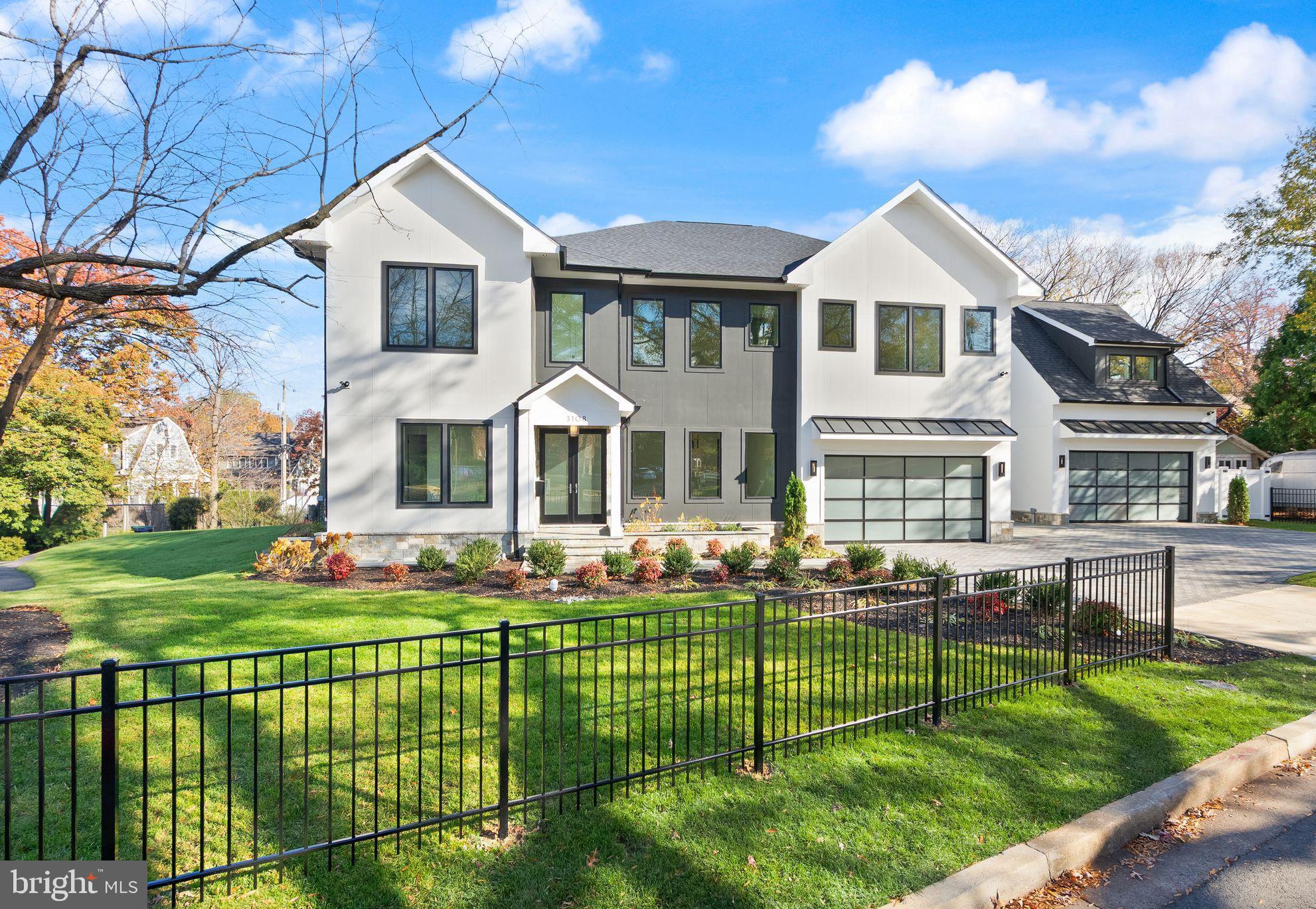 Coming Soon!  Will be staged and active by Dec. 3rd.  Don't miss out!!   Location, Location, LocationExplore an exceptional contemporary residence in Lyon Park, Arlington—a newly constructed masterpiece featuring an elevator and a spacious 4-car garage. This luxurious home, spanning approximately 6,787 square feet, is perfectly situated on a picturesque 0.27-acre corner lot. With its two grand entrances, the home unfolds across three beautifully finished levels, including a bonus office/bedroom suite above a detached two-car garage. Inside, discover 8 bedrooms, 8 full baths, and 2 half baths, offering expansive and meticulously crafted living spaces. An elevator ensures effortless movement between all levels, while a state-of-the-art 2-zone HVAC system in the main house, plus a third zone above the garage, provides personalized climate control. The heart of this home is its exquisitely designed kitchen, seamlessly connecting to a welcoming family room with an elegant electric fireplace. This culinary space features an oversized Quartz island, dual sinks, a Miele dishwasher, a professional-grade 48-inch Wolf range with 6 burners and an infrared griddle, a 48-inch Subzero refrigerator, custom cabinet lighting, and a generous pantry. Adjacent, a butler’s pantry with a sink, beverage cooler, Quartz countertops, and custom lighting adds to the convenience and ambience. Step outside to a serene screened-in stone porch with a ceiling fan, overlooking the private, beautifully landscaped fenced backyard. Entertain effortlessly in the sophisticated dining room or work comfortably from the main level front bedroom/office with its own full bath. The luxurious primary suite upstairs boasts a spacious bedroom with an electric fireplace, coffee wet bar with a beverage cooler, a large, customized walk-in closet, a private balcony, and a lavish primary bath featuring a large glass-enclosed shower with dual shower heads and body sprays, dual vanities, a soaking tub, and a separate toilet room. Four additional private ensuite's and a well-equipped laundry room complete this level. The walk-up lower level is an entertainer’s paradise, featuring a signature Quartz bar with a beverage cooler, dishwasher, and glass shelving with custom lighting, a large recreation room, a bedroom with a full bath, and a media room. Outside, the professionally manicured grounds are enhanced by a black aluminum fencing in the front, PVC fencing in the back, permeable pavers driveway, an attached 2-car garage with epoxy flooring and an EV charger, and a detached 2-car garage with epoxy flooring and EV charger as well as an additional office/bedroom suite above this garage. This residence truly embodies contemporary elegance and sophistication. A block to Zitkala-Sa Park and near Clarendon's Metro, restaurants, shops, services, and nightlife.