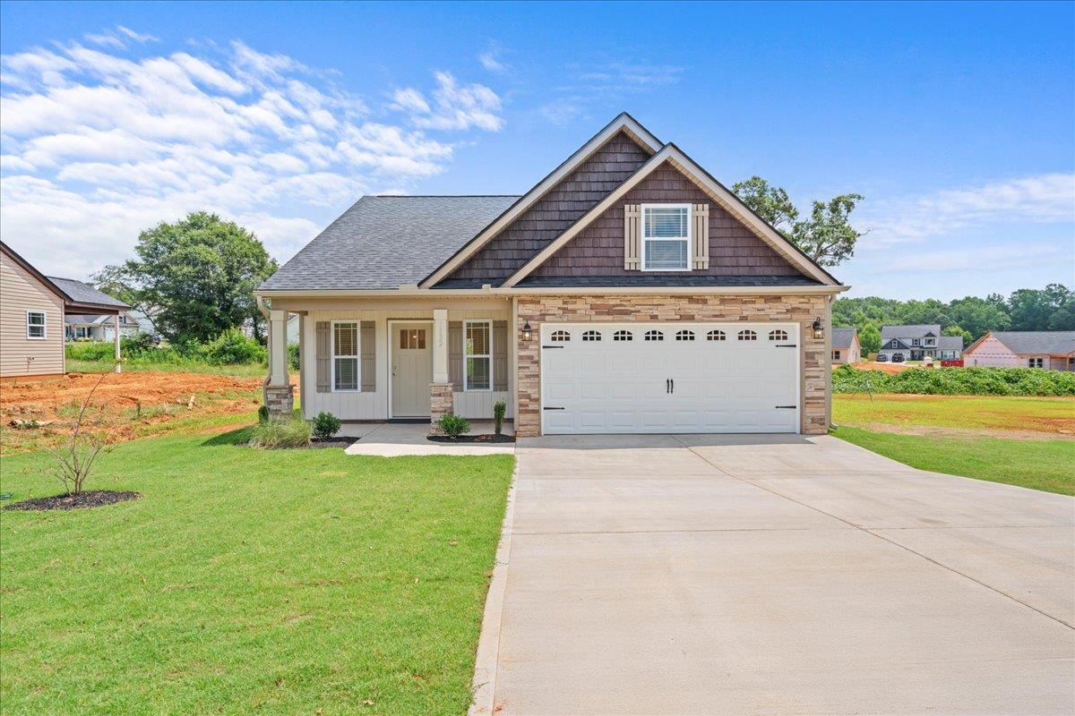 Move in ready! Welcome to the PACIFIC floor plan! This 3 bedroom, 2 bathroom home is situated on a spacious lot. Standard features include luxury vinyl plank flooring, a corner fireplace, trey ceiling with rope lighting in the living and master bedroom, and an 8x16 covered back patio. New Prospect Haven is conveniently located in Inman, just seconds from Lake Bowen! Call today for more info!