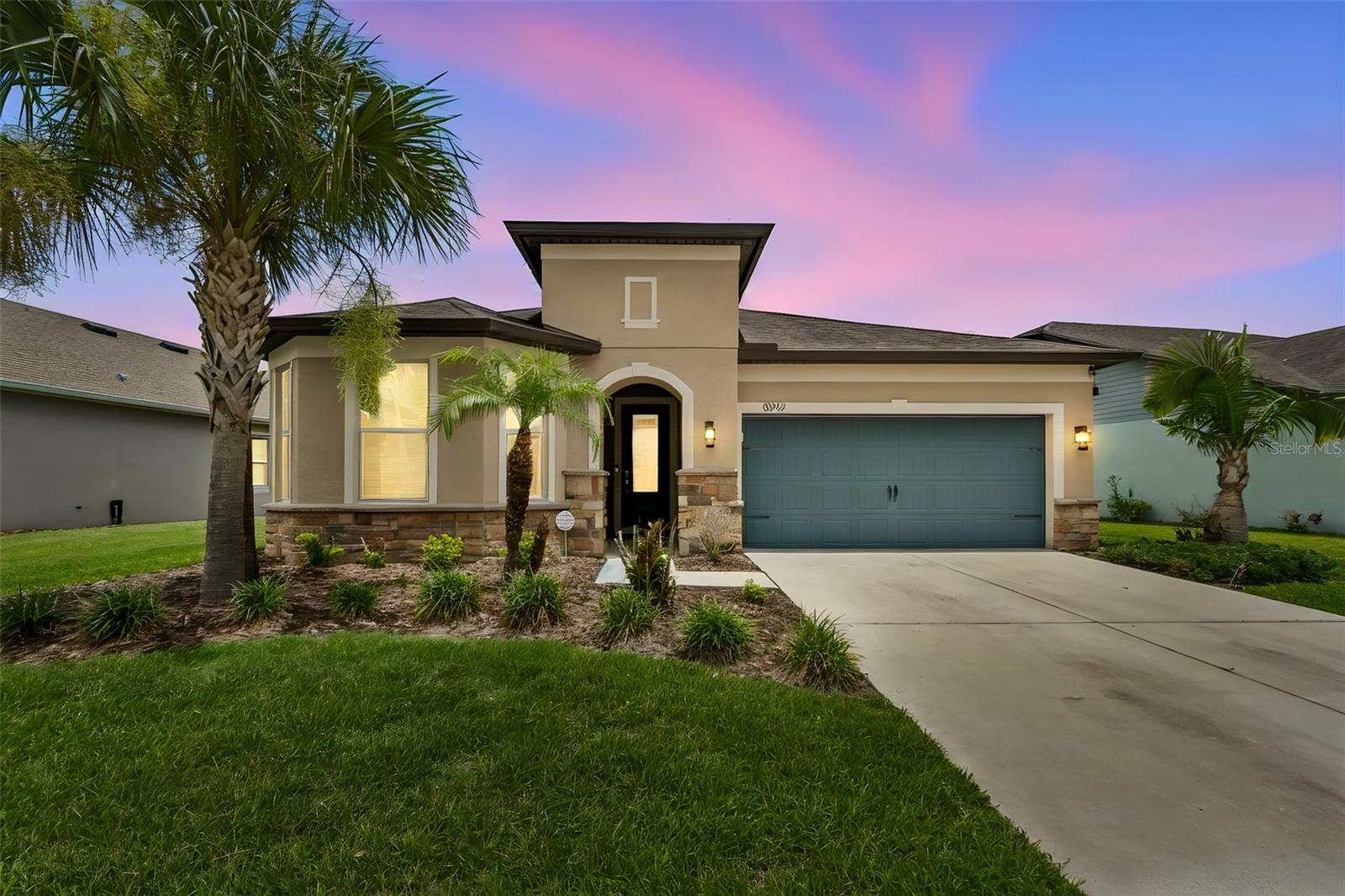 Move-in ready, thoughtfully upgraded, and ideally located in the highly sought-after **Epperson Ranch South** community, **8012 Olive Brook Drive** offers the perfect blend of comfort, style, and Florida living. If you've been waiting for a home where the updates have already been completed and all that's left to do is unpack, this is the opportunity you've been searching for.This beautifully maintained single-story residence features **3 bedrooms, 2 full bathrooms, 1 half bath, and a spacious two-car garage** complete with **overhead storage racks** and a **new garage door opener installed in 2026**, adding both convenience and peace of mind. Designed with an open-concept floor plan, the home seamlessly connects the kitchen, dining, and living areas, creating an inviting space that's perfect for everyday living and entertaining alike.In **2025, the entire interior was freshly painted**, giving the home a bright, clean, and modern feel from the moment you walk through the front door. The well-appointed kitchen features stainless steel appliances, a large center island, abundant cabinetry, a **new designer pull-down kitchen faucet**, and **custom built-in drawer organizers** that maximize both storage and convenience.The spacious owner's suite has been enhanced with thoughtful updates, including **new designer bathroom faucets**, a **new comfort-height toilet**, and a beautifully customized walk-in closet featuring built-in shelving and a **floating dresser system**, creating a California Closet-inspired space that offers both elegance and functionality.Additional features include a **whole-home water softener**, professionally refreshed landscaping, a full irrigation system, privacy fencing, and a large screened lanai that extends your living space outdoors—perfect for enjoying your morning coffee, entertaining family and friends, or simply relaxing while embracing the Florida lifestyle.Living in Epperson means enjoying one of Wesley Chapel's most sought-after communities, featuring the world-famous **Epperson Lagoon** with crystal-clear water, sandy beaches, paddleboarding, kayaking, cabanas, and year-round events. You'll also be just minutes from **The Shops at Wiregrass, KRATE at The Grove, Tampa Premium Outlets, AdventHealth, BayCare Hospital, top-rated restaurants, entertainment, parks, and major highways**, making commuting and everyday conveniences effortless.Conveniently located near highly regarded Pasco County schools, including Wesley Chapel Elementary, Watergrass Elementary, Thomas E. Weightman Middle School, Wesley Chapel High School, Pinecrest Academy, Innovation Preparatory Academy, and Kirkland Ranch Academy of Innovation, this home offers exceptional convenience in one of Tampa Bay's fastest-growing areas.Beautifully maintained, thoughtfully upgraded, and truly move-in ready, this home offers an exceptional opportunity to own in one of Wesley Chapel's premier communities. Schedule your private showing today and experience everything **8012 Olive Brook Drive** has to offer. A video tour is available on Instagram by searching siobhan_sells_in_tampa.