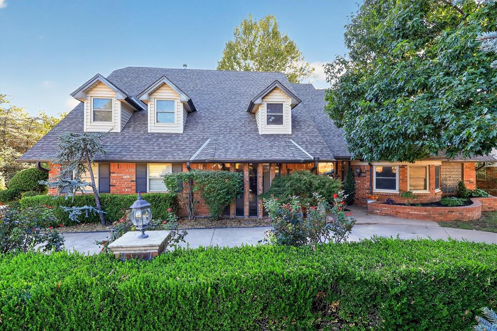 A country-like feel in the city. Minimal yard work. Move-in ready.Enjoy the best of both worlds in Kingswood: approximately 5,000 square feet of beautifully maintained living space, peaceful greenbelt views, and the convenience of having the pool, tennis and basketball courts, and clubhouse just a short walk away.Imagine starting your morning on the back deck with a cup of coffee, looking out over the trees and greenbelt. The green space is maintained for you, giving you the privacy and beauty of a natural setting without the upkeep of a large yard.Inside, a grand foyer opens to a spacious floorplan with wood floors throughout the main level and a stunning three-sided fireplace framed in floor-to-ceiling brick. The living area flows into the oversized chef's kitchen, complete with double ovens, breakfast bar and buffet, then continues into the sunroom and atrium. With views of the greenbelt from nearly every angle, the trees and natural setting become an extension of the home, creating an almost treehouse-like feel.The main-level primary suite is a true retreat, featuring a huge walk-in closet with built-ins, jetted tub, double sinks, and private access to a salon/office. Upstairs, three spacious bedrooms each feature their own attached bathroom and great closet space, with two offering their own interior Juliette balconies. A gigantic laundry room provides plenty of room for storage and organization, while an underground tornado shelter in the garage provides added peace of mind.With brand-new HVAC systems, a newly redone deck, beautiful greenbelt views, and a floorplan designed for both everyday living and gathering, this home is ready for you to move in and enjoy.Room to spread out. Room to gather. A view you'll never get tired of—and a lifestyle that's hard to find. Come see it for yourself.