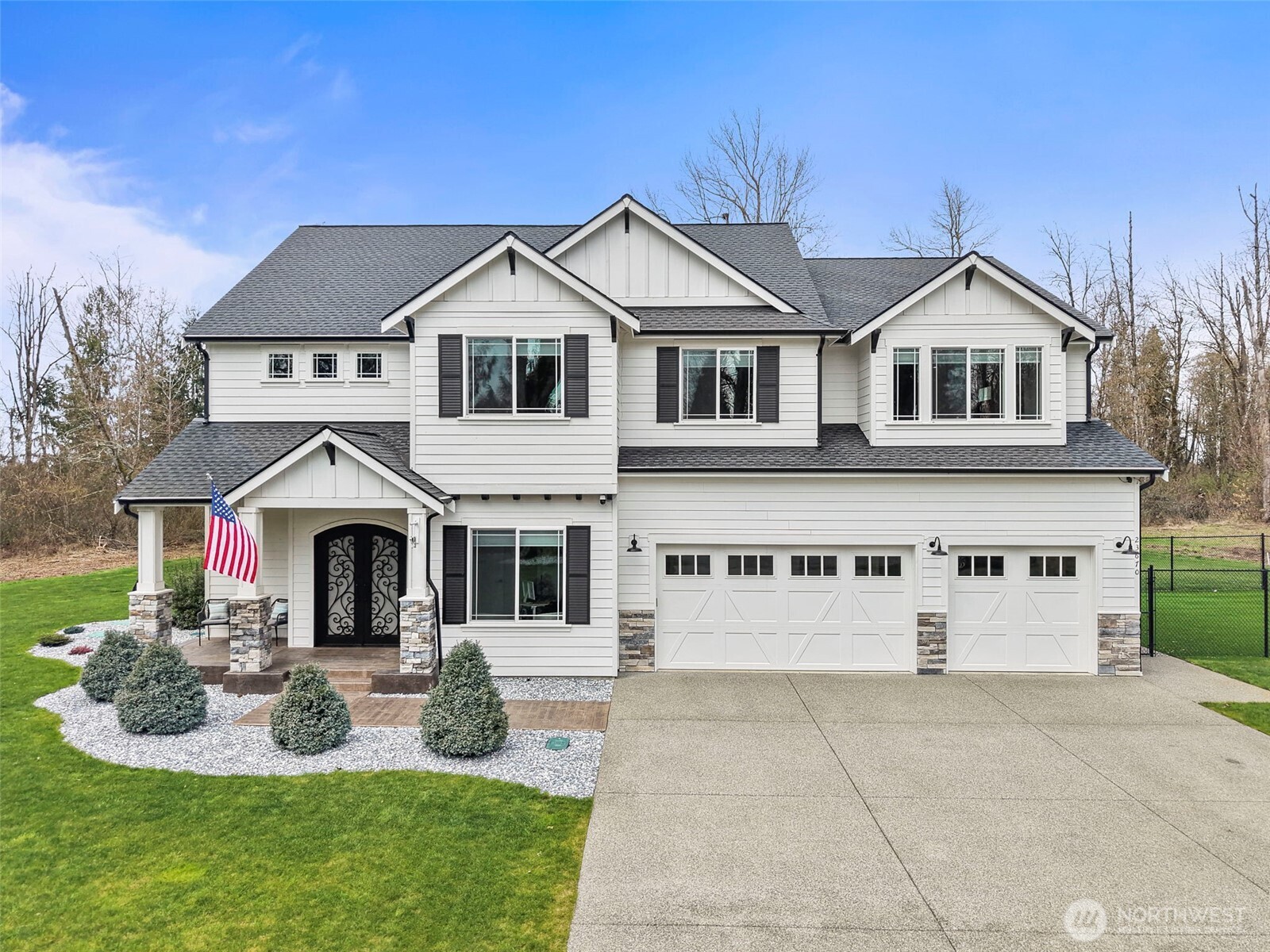 Custom built in 2019, 3,820SF, 4-bed, 2.5 bath home, on a serene forested 19.55 AC parcel w/ Mt. Rainier views! Perfectly appointed kitchen w/ granite counters, large island, double ovens, 64" fridge/freezer combo, tons of custom cabinet storage, massive walk-in pantry & adjacent dining area big enough for 12-person seating (table & 10 chairs included). Open concept living room w/ gas fireplace insert, live edge mantle, stone surround & wall of built-ins. Huge primary bed w/ luxurious private bath that features, 3 vanities, tile floors, 2-head + rain head tile shower, free standing soaking tub, 140+SF walk in closet & walk in linen closet. Laundry room w/ cabinet storage, granite counter, mud sink + additional linen/storage. 10' ceilings on the main w/ 9'/vaulted ceilings up. 21' x 19' bonus room up w/ closet storage. Whole home water filtration system, built in vac system, tankless gas HW, & built-in speakers w/volume controls. Beautiful entry w/stamped concrete covered patio & ornate metal entry doors + a huge, floor height, stamped concrete covered back patio w/ infrared heaters. Natural gas powered 16KW Generac, whole house, generator system. Turf dog run + stainless steel dog wash in the attached 4-car garage w/ drive thru bay. Grow ready raised garden beds w/nearby garden shed & playset. Property is in the City of Enumclaw Urban Reserve designation for future development potential. Country living at its finest just minutes from downtown. Truly a must-see home!