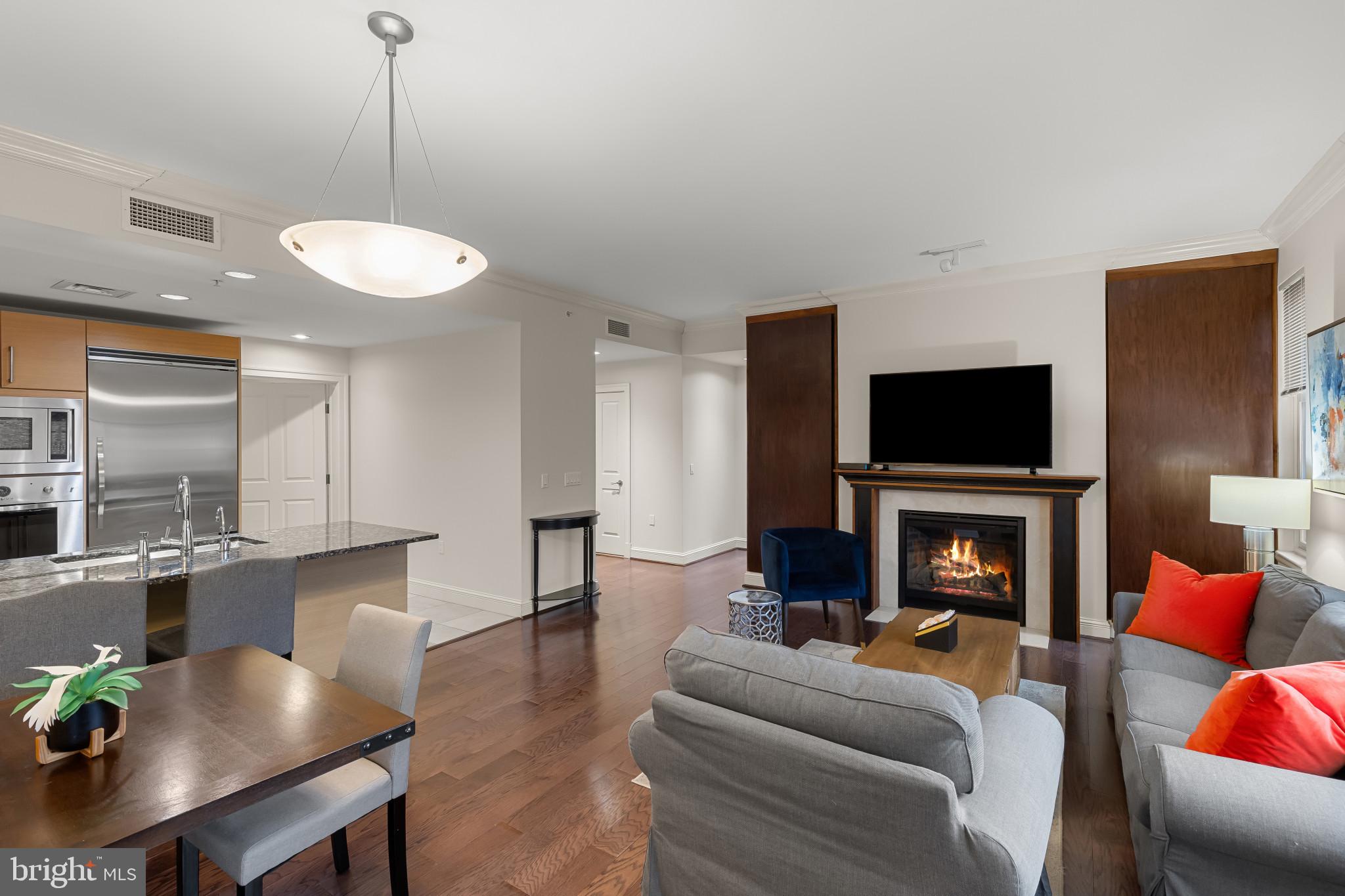 Beautifully furnished and light filled one bedroom, one full bath and one half bath with over 1,300 square feet of space on the terrace level at the Ritz-Carlton Residences Baltimore. An open floor plan accompanied by high end Viking Appliances and dark hardwood floors, accented with a marble fireplace, makes for a versatile and superior living space. The expansive primary suite comes complete with walk in closet and spacious marble spa bath which includes large walk-in shower and a jetted garden tub. In addition to the impressive interior features, residents may also enjoy the many services and amenities of a Ritz-Carlton 5-star Hotel in the privacy of their own home including valet parking, porter service, doorman, dedicated concierge, 24-hour onsite security, guest suites, salt water indoor pool, fitness center, movie theater, board room, and game and billiard room as well as meticulously maintained gardens and grounds. The Ritz-Carlton Residences is conveniently located on the Inner Harbor and Promenade and steps from Federal Hill Park, the water taxi, and restaurants. Extremely quick access to I-95, 83N, BWI, and Penn Station. Schedule your tour today.