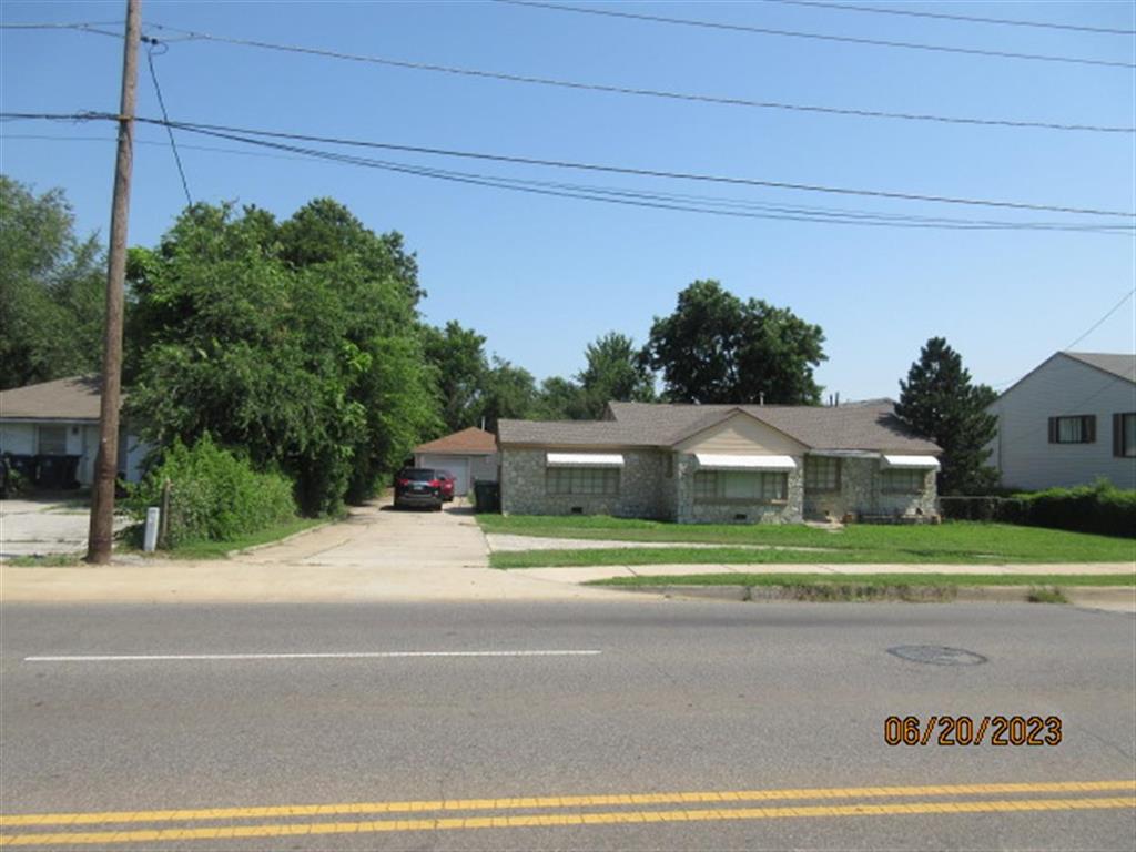 Home was recently updated with newer wood like laminate and carpet, some new paint, new toilet, bathroom mirror and lights, ceiling fans.  Clean with lots of potential for commercial or home business.  Seller is Realtor, license #112245.  
This is an AS-IS sale.