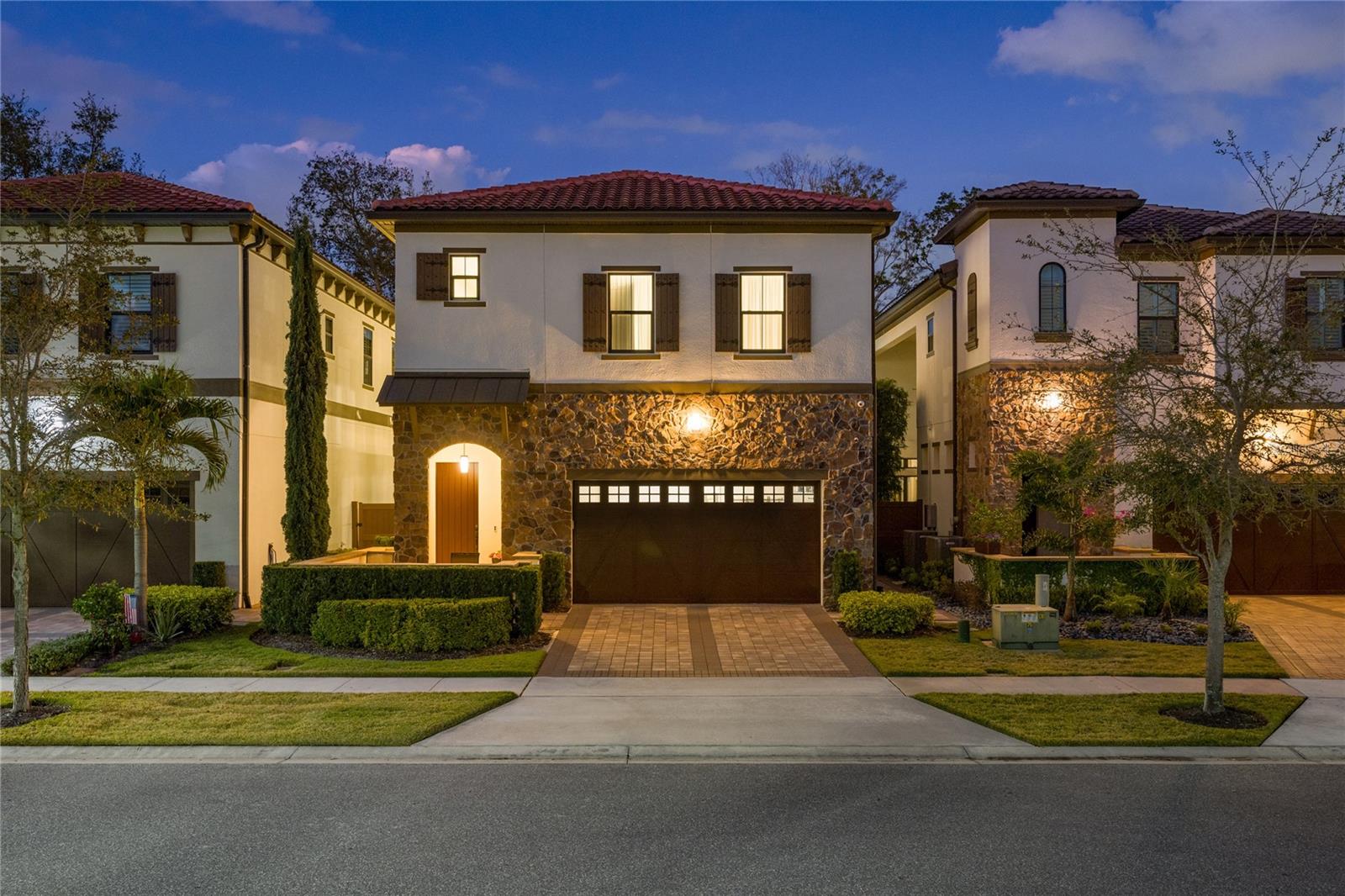 Under contract-accepting backup offers. Discover a lifestyle of unparalleled sophistication and convenience in this exquisite 4-bedroom 4.5 bath home, nestled within the exclusive gated community of Residences at Dellagio. With only 83 homes, this enclave offers a rare blend of privacy, luxury, and convenience, all in the heart of Dr. Phillips. As you step inside, you're welcomed by a bright, open floor plan designed for both relaxation and entertainment. The chef’s kitchen is a true showpiece, featuring top-of-the-line stainless steel appliances, an oversized center island, and striking quartz countertops—perfect for culinary enthusiasts. This home is thoughtfully designed with a rare double primary suite, one on the first floor and another on the second, offering exceptional flexibility and privacy. Each additional bedroom features an en-suite bathroom, ensuring comfort for family and guests alike. Blurring the line between indoor and outdoor living, expansive glass sliding doors open to a beautifully designed outdoor space—ideal for hosting guests or unwinding in the fresh air. A large bonus room on the second floor provides endless possibilities for a home theater, office, or playroom. Situated within walking distance of renowned Restaurant Row, this home places you at the center of world-class dining, gourmet cafes, and vibrant nightlife. Everyday conveniences are at your fingertips, with Trader Joe’s, Whole Foods, and high-end shopping all within a mile radius. Beyond the immediate vicinity, enjoy seamless access to International Drive, Orlando’s world-famous theme parks, the international airport and major highways. Within the community, residents enjoy resort-style amenities, including a sparkling pool, an entertainment area with a cozy firepit, and beautifully maintained green spaces. Don’t miss your opportunity to own this amazing home.