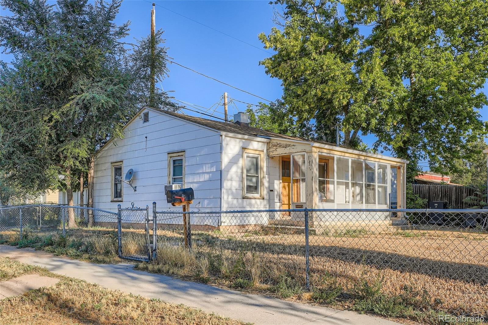 Great location on a corner lot - terrific redevelopment opportunity and priced accordingly - no low offers please.   There will not be a property disclosure. Property is sold as-is. Seller has no knowledge of the home or property. Similar lots in the area have been redeveloped into paired homes. Per the city of Englewood, property is zoned as R-2-B. Buyer responsible for confirming zoning for permissible uses. This is a fantastic opportunity for the right buyer.  Offers require a 72 hour response time and no weekend acceptance deadlines. Easy access to show.