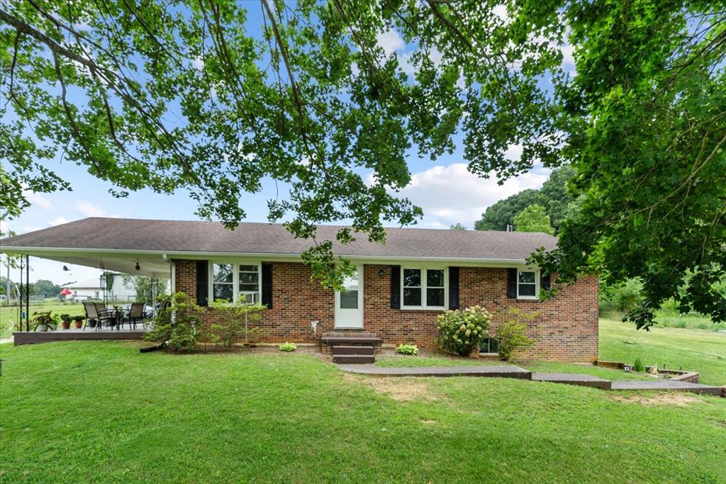 Discover the perfect blend of small town charm and country style living with this well maintained 1970s brick ranch, ideally situated on approximately 1.60 acres within the town limits of Rural Retreat, Virginia. Offering the convenience of public water and sewer while providing the space and privacy rarely found in town, this property presents a unique opportunity to enjoy the best of both worlds. Inside, you'll find a thoughtfully updated kitchen that serves as the heart of the home, complete with a conveniently located laundry area. The recently purchased washer and dryer convey, adding immediate value and convenience for the new owners. The comfortable floor plan offers a welcoming atmosphere, making it easy to feel right at home. Step outside and discover the true highlight of this property the expansive 1.60-acre lot. Whether you envision lush gardens, a children's play area, outdoor entertaining spaces, or simply a peaceful retreat to enjoy nature, the possibilities are endless. There's ample room to create your own private oasis while still enjoying all the conveniences of town living. Located less than one mile from Interstate 81, this property offers quick access for commuters while remaining just minutes from local shopping, restaurants, schools, medical facilities, and other everyday conveniences. For added peace of mind, the Rural Retreat Fire Department and EMS services are located nearby. Rural Retreat is known for its welcoming community, annual festivals, farmers market, parks, and small town hospitality, while nearby attractions such as the Jefferson National Forest, Hungry Mother State Park, and the New River provide endless opportunities for hiking, fishing, kayaking, camping, and outdoor recreation.