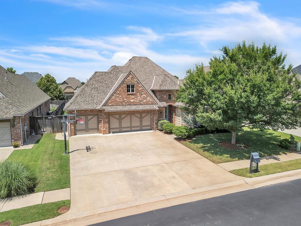 Welcome to 2601 Merlot Court – where luxury meets flexibility in one of Edmond’s most charming, gated communities. This beautifully appointed home offers a versatile layout with up to 5 spacious bedrooms, including 4 bedrooms on the main floor, and 4 full baths, providing ample space for family and guests. Step inside to discover stunning Carrera marble throughout, adding timeless elegance to every room. The chef’s kitchen is equipped with premium stainless-steel appliances, including a built-in side-by-side refrigerator and freezer, under-counter microwave, and wine fridge, perfect for entertaining. Enjoy comfort and efficiency with a tankless water heater and brand-new HVAC system (2025). The outdoor living space is equally impressive, featuring a relaxing covered patio with a mounted TV, built-in grill, and fireplace — ideal for year-round enjoyment. Located in a gated neighborhood with yard and flower bed maintenance included, you’ll also love access to the community pool just steps away. All this, plus highly sought-after Edmond schools, make this home a rare find. Schedule your private tour today and experience 2601 Merlot Court for yourself!