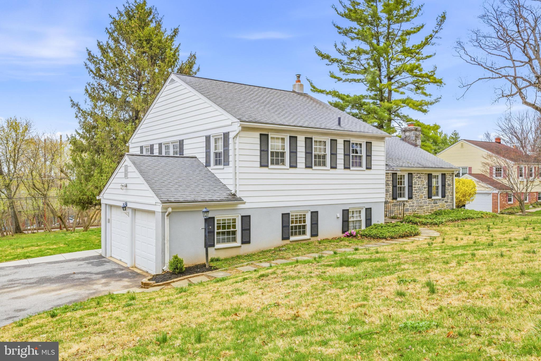 Welcome to 329 Devonshire Road, a sun-filled split-level home in one of Devon’s most desirable Main Line neighborhoods. Set across from Jenkins Arboretum and near Teegarden Park, this home offers a rare combination of peaceful surroundings, a quiet walkable setting, and easy access to the Devon train station, Devon Yard and less than 10 minutes to all the restaurants and shops in Wayne. Located in top ranked Tredyffrin-Easttown School District, the location alone is hard to beat especially with taxes at $8100 for 2026. Inside, natural light pours through the home and highlights the hardwood floors and comfortable, functional layout. The main level features a spacious living room with fireplace, a formal dining room, and an updated kitchen with a pass-through window overlooking the living space. Just a half flight down, the inviting lower level offers a large second living area, perfect for hosting or everyday family life, along with the laundry area. Upstairs, the primary suite includes its own bath, while two additional well-sized bedrooms share a full hall bathroom.This home has been thoughtfully maintained and improved, with updates by the current owners including: kitchen cabinets, counters, new HVAC system, a Generac whole-house generator, back patio, and fresh paint throughout. A walk-up attic provides excellent storage and offers future potential for finished bonus space.Outside, the deep backyard is a true standout. The stamped concrete patio is perfect for entertaining, grilling, or simply enjoying the private outdoor setting, and the yard offers ample space with the ability to tie into neighbors fencing to create a huge backyard play area. Warm, welcoming, and exceptionally well located.  329 Devonshire offers the rare opportunity to enjoy timeless neighborhood charm, meaningful updates, and a location that puts nature, parks, transit, and Main Line amenities just minutes away. Showings will be April 11-12th, contact listing agents for more information!
