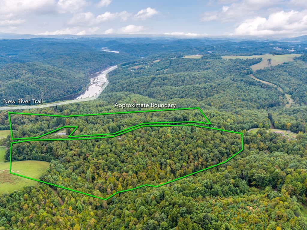 23+ Unrestricted Acres in Fries, VA – Ideal Horse Property & Outdoor Retreat Discover 23+ acres of unrestricted land in Fries, Virginia, offering the perfect blend of privacy, recreation, and convenience. With a level building site already equipped with a well and septic system, this property is ready for your dream home, mini-farm, or mountain getaway. Enjoy direct access to outdoor adventure with the New River Trail just moments away—perfect for horseback riding, biking, hiking, and more. Fish or kayak the New River, explore the nearby town of Fries, or venture less than one mile to the Jefferson National Forest for endless hunting and wildlife opportunities. Whether you're seeking a private retreat, a horse property, or a place to build and enjoy the Blue Ridge lifestyle, this rare offering provides unmatched freedom and potential. Additional acreage is also available.