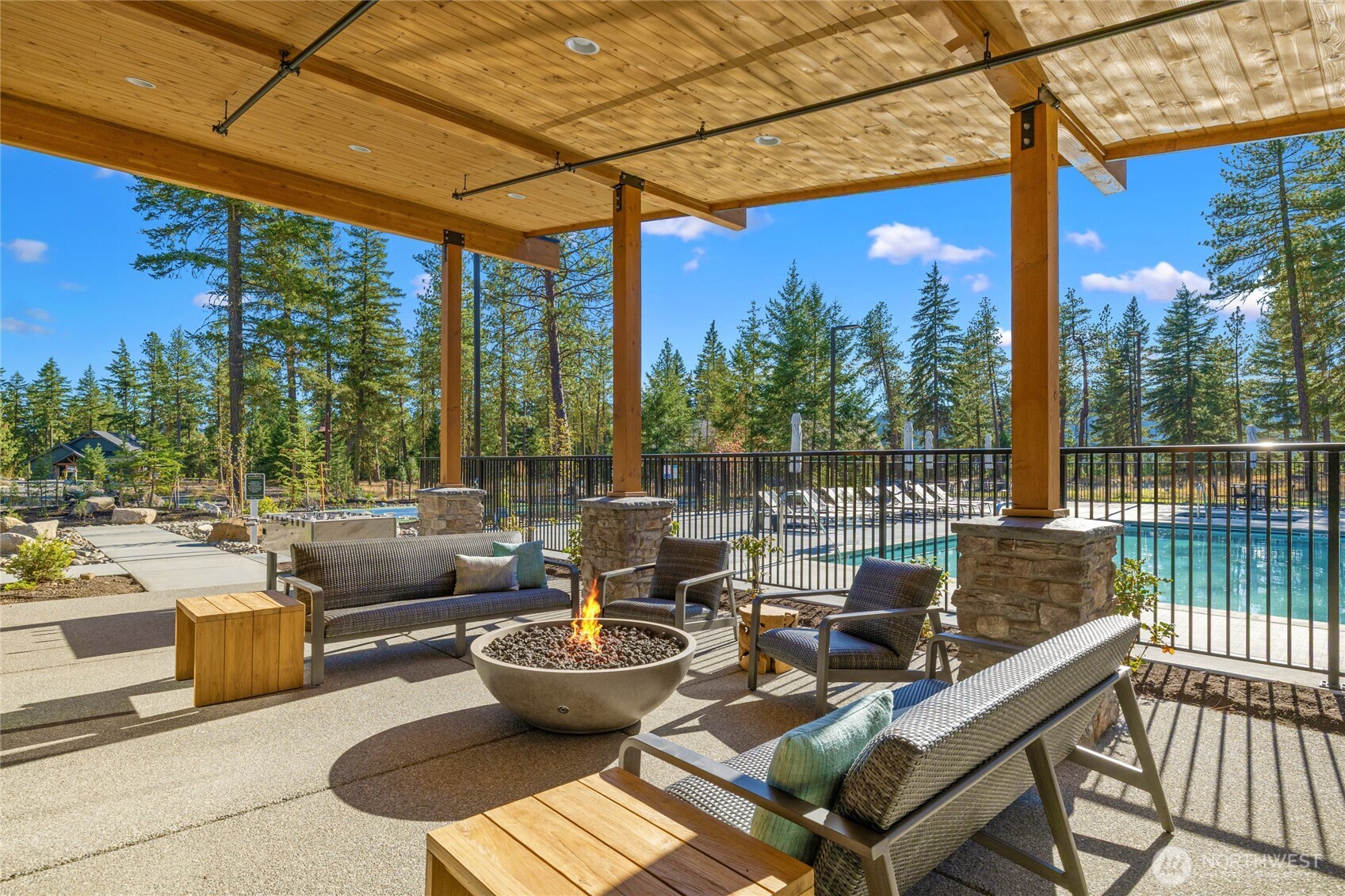 Clubhouse with large, covered patio and gas firepit.