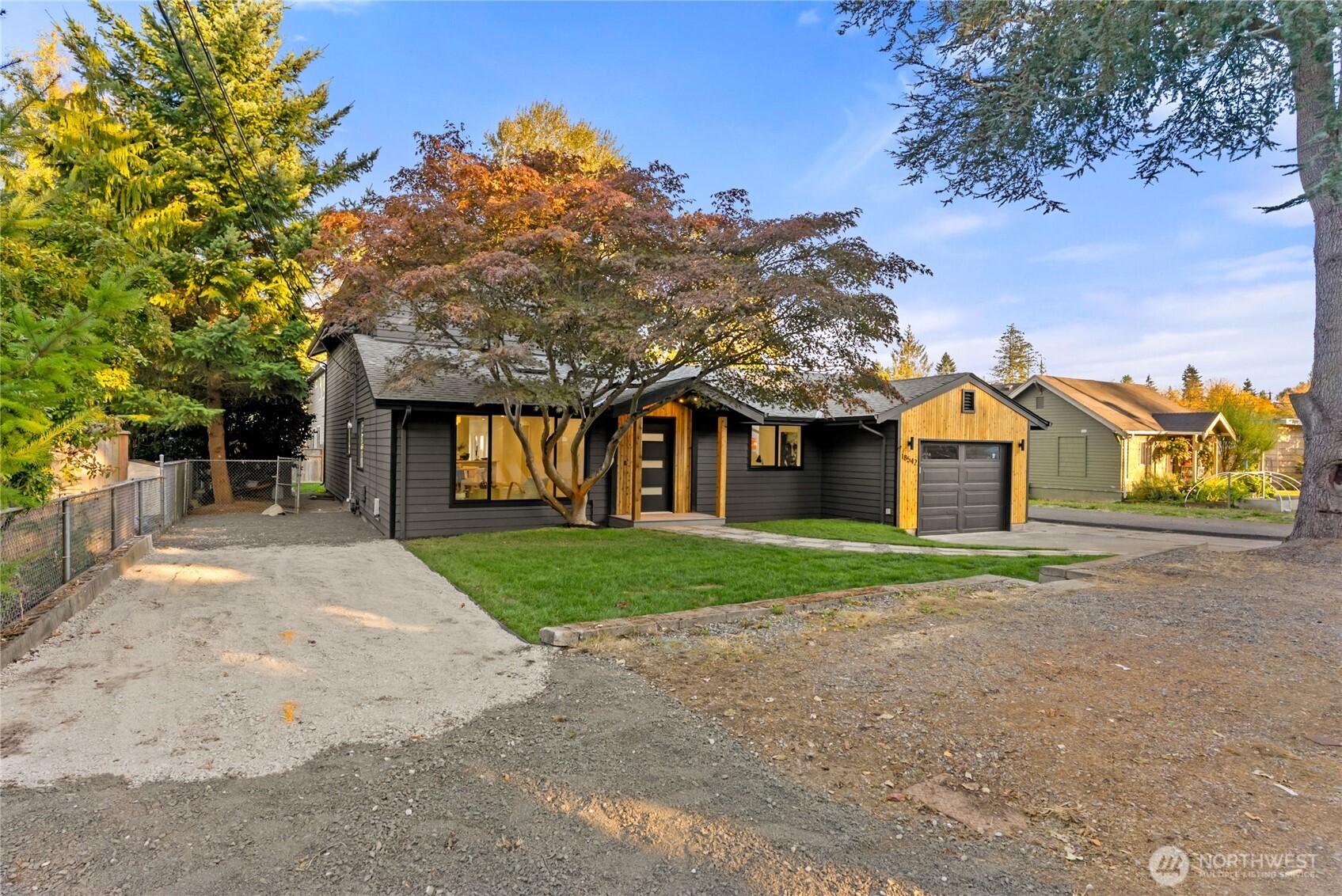 Stunning must-see home featuring RV parking,500 sq ft Trex deck w/8-person hot tub,&fully fenced yard.Main level offers vaulted ceilings,updated kitchen w/quartz countertops,full tile backsplash,custom cabinets,&SS appliances.2 bedrooms on main floor,custom utility room w/dog wash station,&tankless water heater.Spacious family room opens to large deck perfect for entertaining.Upper level features oversized primary suite w/custom tile work,walk-in shower,plus additional bedroom & guest bath.Front yard highlights a rare Japanese Maple tree,&property includes 8x18 storage shed.Conveniently located near light rail station,shopping,beaches,&parks.Move-in ready w/thoughtful upgrades throughout - this home combines modern comfort,functionality.