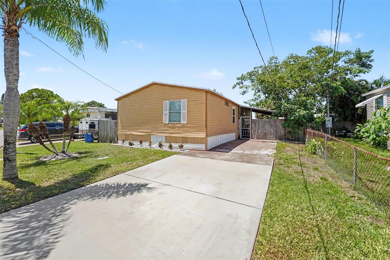 Virtually Staged. TARPON SPRINGS LIFESTYLE — MINUTES TO THE SPONGE DOCKS, BEACHES & MORE!Location, lifestyle, and opportunity come together in this 3-bedroom, 2-bath home in beautiful Tarpon Springs! Ideally situated within walking distance of the world-famous Tarpon Springs Sponge Docks, you’ll be close to waterfront dining, shopping, festivals, entertainment, and everything that makes this historic Gulf Coast community so special.Enjoy the best of Florida living with Sunset Beach and Fred Howard Park just a golf-cart ride away, plus nearby access to the Pinellas Trail, fishing spots, parks, dog parks, marinas, and waterfront restaurants. Whether you love boating, fishing, biking, beaches, or exploring downtown Tarpon Springs, there is always something to do nearby.Even better — NO HOA and NO AGE RESTRICTIONS! The home features a fenced backyard, providing plenty of room for pets, outdoor entertaining, gardening, or creating your own private Florida retreat.Inside, this home offers a great opportunity to add your personal touches and build equity. The primary bathroom has already been prepared for renovation, giving the new owner a head start on creating a space that fits their own style and vision.Perfect for a primary residence, Florida getaway, seasonal home, or investment opportunity, this property combines location, flexibility, and value in one of Pinellas County’s most unique coastal communities.Live close to the beaches, Sponge Docks, parks, trails, fishing, dining, and entertainment — and enjoy the Tarpon Springs lifestyle at an affordable price. Schedule your showing today and imagine the possibilities!