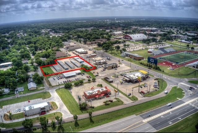 Exceptional Self-Storage Investment Opportunity Near East Texas A&M University - the fastest-growing campus in the Texas A&M University system. This well-maintained self-storage facility offers an outstanding investment opportunity with strong income-producing potential and room for future expansion. Situated on over one acre of land, the property features a total of six freestanding, all-steel constructed buildings, designed for durability and low maintenance. The facility currently includes 173 rentable units with a balanced mix of sizes to meet a wide range of tenant needs: 5x10, 10x10, 10x15, 10x20. This variety of unit sizes allows the facility to serve both residential and commercial customers, including students, faculty, and residents from the surrounding community. The complex is equipped with a large on-site office, complete with air conditioning, providing a comfortable space for staff and customers. The facility is fully fenced and secured by an automatic gated entry system, security lighting, and a comprehensive surveillance camera network, ensuring peace of mind for tenants and ownership alike. Key Investment Highlights: Prime Location: High-visibility site within walking distance of a rapidly growing university campus, providing a built-in and expanding tenant base. Turnkey Operation: Professionally maintained with minimal immediate capital needs. Strong Demand Drivers: Proximity to university housing, residential neighborhoods, and local businesses. Security & Infrastructure: Secure perimeter fencing, gate access, and modern surveillance systems in place. Expansion Potential: The lot provides additional space for future development or added storage capacity (see aerial image for reference). Given the rising demand for self-storage in college towns and secondary markets, this property is well-positioned for consistent occupancy, reliable cash flow, and long-term asset appreciation.