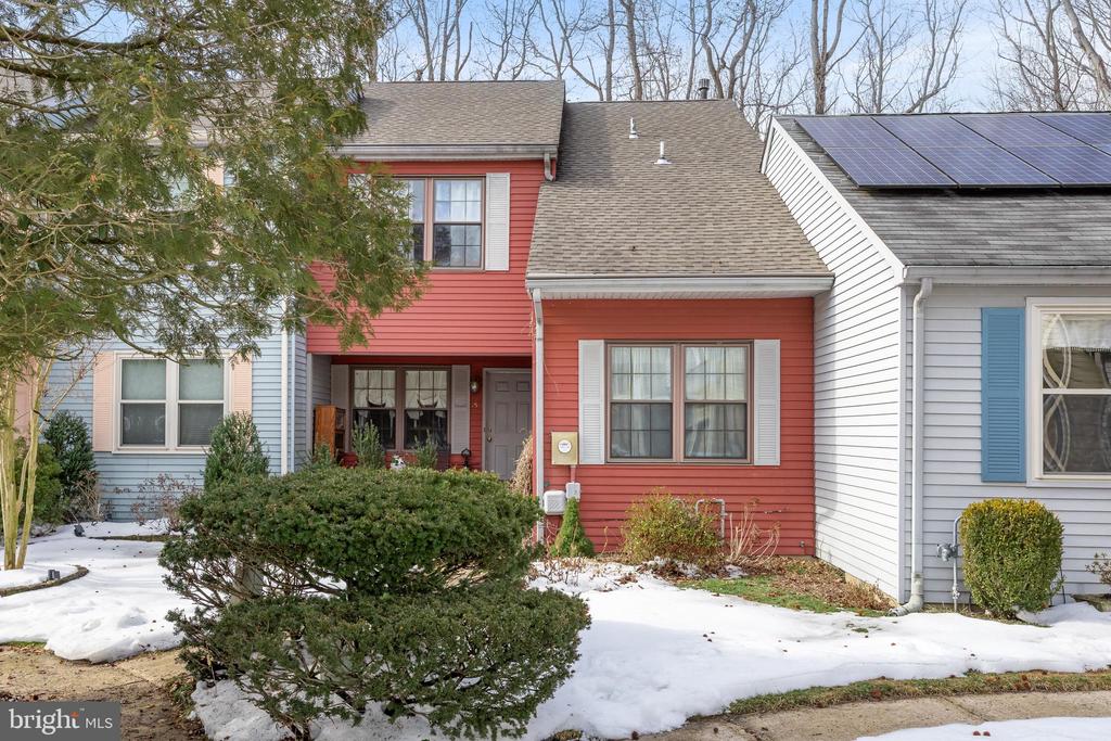 Welcome to this beautifully updated two-story townhome located in the desirable Taunton Trace community in Medford. This spacious 3-bedroom, 2.5-bath home offers a flexible and thoughtfully designed layout. Just off the entryway is a large bonus room currently used as a home office, but ideal as a first-floor bedroom, family room, playroom, or private retreat. The remodeled eat-in kitchen (2020) features quartz countertops, a tile backsplash, new sink, and solid brass faucet, along with a newer stove (2022). The first floor also includes a formal dining room and a spacious living room overlooking the wooded backyard, creating a warm and inviting space for both everyday living and entertaining. A beautifully updated powder room (2020) with quartz countertop and a large under-stair storage area add both style and functionality. Luxury vinyl plank flooring runs throughout the entire first floor.Upstairs, you’ll find three generously sized bedrooms, two full bathrooms, and a convenient laundry area. The primary suite offers a walk-in closet and private ensuite bath. Major updates include a new HVAC system (December 2024) and water heater (November 2024), providing peace of mind for years to come. Additional highlights include gutter guards and a private patio overlooking the wooded rear yard—perfect for relaxing or outdoor gatherings.Taunton Trace is a 294-unit, fee-simple townhome community set on approximately 200 acres of densely wooded land—often referred to as the “best kept secret” in Medford. The neighborhood features 10 individual courts with common grounds, three scenic lakes, a basketball court, tennis court, and play areas, all within the highly rated Lenape School District. Conveniently located near shopping, dining, and major roadways, it is just 30 minutes to Philadelphia and about an hour to the Jersey Shore.Enjoy low-maintenance living in a scenic, amenity-filled community close to everything Medford has to offer. This home is a must see!
