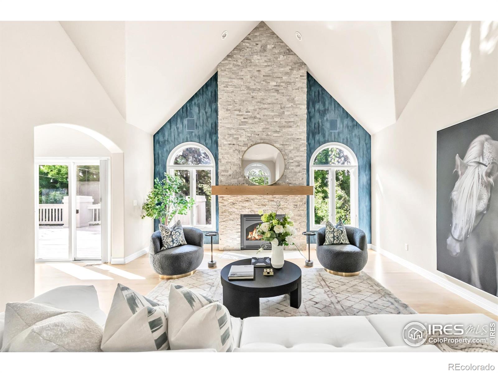 A light-filled and updated retreat awaits in this sprawling home within The Greens at Pinehurst, a coveted golf cart community. Mature trees envelop the property, creating a treehouse-like ambiance throughout. Inside, a soaring double-height entryway opens to a vaulted office with built-in storage and a formal dining room framed by bay windows. The towering great room seamlessly connects to an open-concept living, dining, and kitchen area-complete with a massive center island, sleek cabinetry, and high-end appliances. Conveniently located on the main floor, the luxe primary suiteboasts a deep corner soaking tub and walk-in shower. Two large bedrooms with ensuite bathrooms and walking closets.The newly renovated basement is designed for entertaining, featuring a wet bar, theater room with an acoustically transparent screen, and walk-out access to a backyard haven. With lush landscaping, a spacious balcony, and a verdant lawn that doubles as a sledding hill in the winter, the outdoor spaces are truly an oasis. This tight-knit community enriches daily life with a vibrant calendar of events, convenient access to top-rated schools-including Colorado Academy, DenverChristian, and Mullen-and the ease of being just a golf cart ride from Pinehurst Country Club, making this home a rare offering in one of Denver's most coveted neighborhoods.