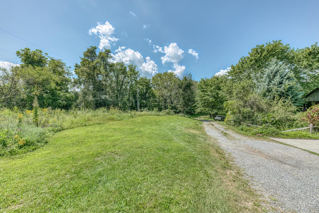Discover the perfect place to build your dream home on this spacious, cleared, and flat 1-acre lot located within the town limits of Marion. Nestled in a peaceful neighborhood, this rare find offers the ideal blend of tranquility and convenience—with easy access to downtown amenities, schools, shopping, and dining. Enjoy the benefits of available public water and sewer connections. With plenty of room for a large yard, garden, or outdoor living space, this lot is perfect for anyone looking to create a personal retreat with room to grow. Whether you're planning your forever home or a weekend getaway, this property provides the canvas to bring your vision to life. Don't miss out—lots like this in town are hard to come by! Subject to errors and omissions. Buyer's agent to verify details.
