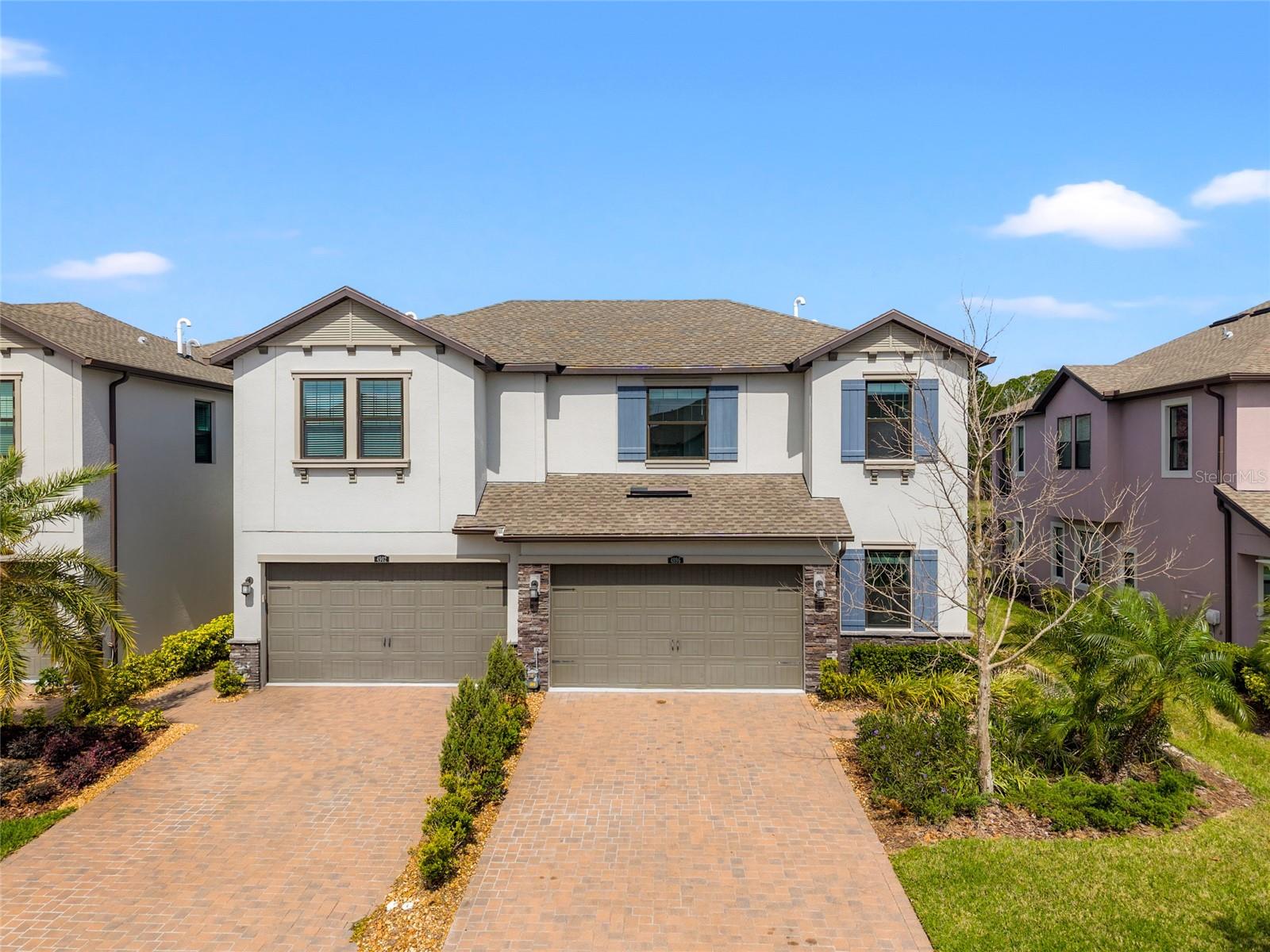 Welcome to 4896 San Martino Dr in the heart of Estancia at Wiregrass Ranch. This 2019-built townhome offers 4 bedrooms, 2.5 baths, and  modern living across two stories. The open layout features ceramic tile in the main living areas, carpeted bedrooms, and a full appliance package including washer, dryer, and a tankless water heater. A 2-car garage, dedicated laundry room, and irrigation system complete this low-maintenance home.Community highlights: resort-style clubhouse with fitness center, dedicated dog park, playground, community parks, and miles of sidewalks. Zoned for A-rated Wiregrass schools (Wiregrass Elementary, John Long Middle, Wiregrass Ranch High). Minutes to shopping, dining, and entertainment, with quick access to I-75 and Bruce B. Downs Blvd.