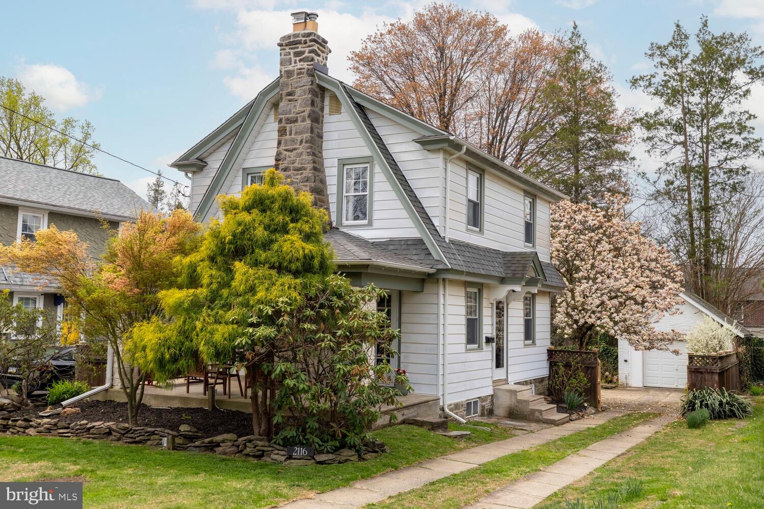 Don't miss this classic Ardmore single-family Colonial on a quiet, friendly, walkable block! The first floor sets the tone: a generous living room anchored by a stone surround fireplace, a sun-filled formal dining room, and a beautifully updated eat-in kitchen with vaulted ceilings, granite counters, subway tile backsplash, and stainless appliances. The kitchen opens to a spacious private backyard. Hardwood floors and natural light throughout. Upstairs, three well-proportioned bedrooms and a spacious hall bath. Downstairs, a finished basement with overhead lighting and a half bath — great for a playroom, home office, or guest overflow. Steps from South Ardmore Park, Carlino's Market, Sam's Brick Oven Pizza, coffee shops, restaurants, with Amtrak/SEPTA and the Norristown High Speed Line nearby for an easy commute. When you need to venture a little further, Trader Joe's, Whole Foods, Suburban Square, Ardmore Music Hall, the Haverford YMCA, and Merion Golf Club, are all just a short drive away. Large private driveway, detached garage, front porch and a backyard that feels removed from everything — even though everything is a short walk away. That's a rare combination in Ardmore. And it won't last!