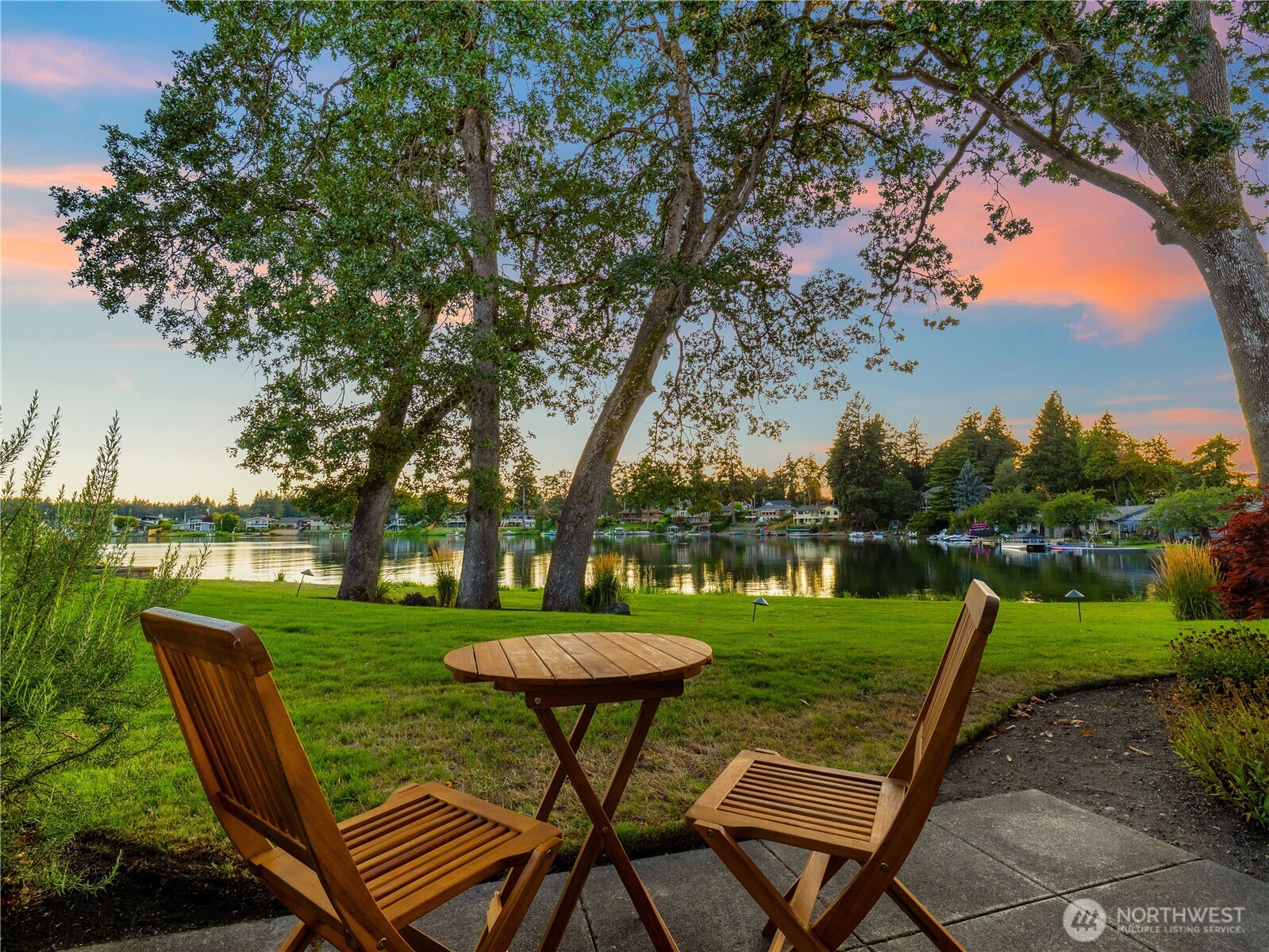 Experience breathtaking waterfront living at 7310 Steilacoom Blvd SW! This beautifully remodeled two-story unit offers stunning water views from multiple locations throughout the home, with a coveted western-facing orientation capturing spectacular sunsets over the water. The flexible two-floor layout is ideal for multigenerational living, providing space and privacy for everyone. The interior has been freshly painted feeling bright, clean, and move-in ready. Thoughtfully remodeled in 2019 with an updated kitchen, spa like primary bath, flooring and more. Includes a 2-year-old heat pump, and a brand-new roof—with the remaining units in the community currently receiving new roofs as well. Enjoy shared dock access for relaxing by the water and taking in the views. A large 2-car garage provides ample room for vehicles, storage, and recreational gear. Located in an all-ages community, this home is conveniently situated just minutes from JBLM and I-5 access, making commuting a breeze. Plus, water and garbage are included in the lease, adding even more value and convenience. From morning waterfront views to spectacular evening sunsets, this is a rare opportunity to enjoy updated, spacious waterfront living in a prime Lakewood location.