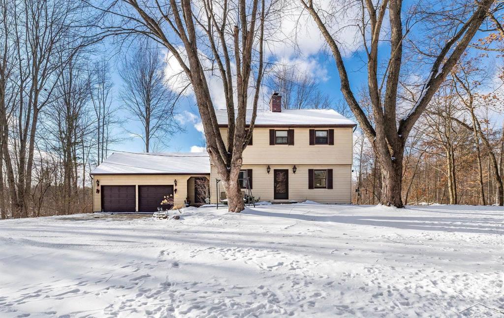 Enjoy space, privacy, and everyday comfort on over 5 acres just minutes from Downtown Midland and Bullock Creek Schools-a combination that rarely comes available. This updated 3-bedroom, 2.5-bath home offers a flexible layout with space for work, hobbies, and everyday living, along with room for outdoor enjoyment and future expansion. Inside, the home is move-in ready with fresh interior paint, newer flooring, and an updated kitchen featuring newer appliances, a breakfast nook, and a formal dining area suited for gatherings. The living room centers around a fireplace and looks out over a private, wooded backyard with frequent wildlife views. A practical mudroom entry off the attached garage includes laundry and a half bath, offering a functional setup for daily living. The finished lower level provides additional finished space for a recreation area, office, or hobby room, complete with a wood-burning stove for cozy evenings. All three bedrooms are located on the upper level, including a primary suite with a private full bathroom. Outdoor features include a large composite deck ideal for outdoor living, a private drive lined with apple trees, and two parcels-each with its own tax code. The additional parcel already has city water available, making it well suited for a pole barn, hobby farm, or future building opportunity. Modern conveniences include city water, natural gas, central air, high-speed Charter internet, and a generator transfer switch-offering the comfort and connectivity of town while enjoying a private, wooded setting. A pre-listing inspection has been completed, and recent improvements over the past five years include major mechanical, electrical, and exterior updates. Major systems have been well maintained and are in good working condition, providing confidence for the next owner.