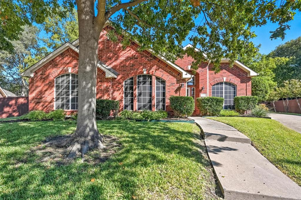 Located in the highly-acclaimed Allen ISD, this beautiful 4-bedroom, 1-story home features a wonderful floor plan and a HUGE .3-acre yard! The backyard is a true green oasis, backing to the elementary school for ultimate privacy and offering convenient gated access for a quick walk to school. With freshly laid sod, this space is ready for all your outdoor dreams. Inside, you'll find a spacious living room and kitchen featuring warm wood flooring, a stylish fireplace, and a wall of windows offering great views. The chef’s kitchen boasts tons of white cabinet and counter space, granite countertops, double ovens, a gas range, a central island, and a breakfast bar. The huge primary suite offers a sitting area and an ensuite bathroom complete with granite countertops, separate vanities, a huge glass-framed shower, a soaking tub, and a large walk-in closet. Three split bedrooms—one currently used as an office—and a large full bathroom with dual sinks and granite countertops complete the interior. A long, swing driveway leads to the oversized 2-car garage, providing excellent overflow parking. Enjoy a short distance to the neighborhood pool, multiple parks, shopping, dining, and major highways!