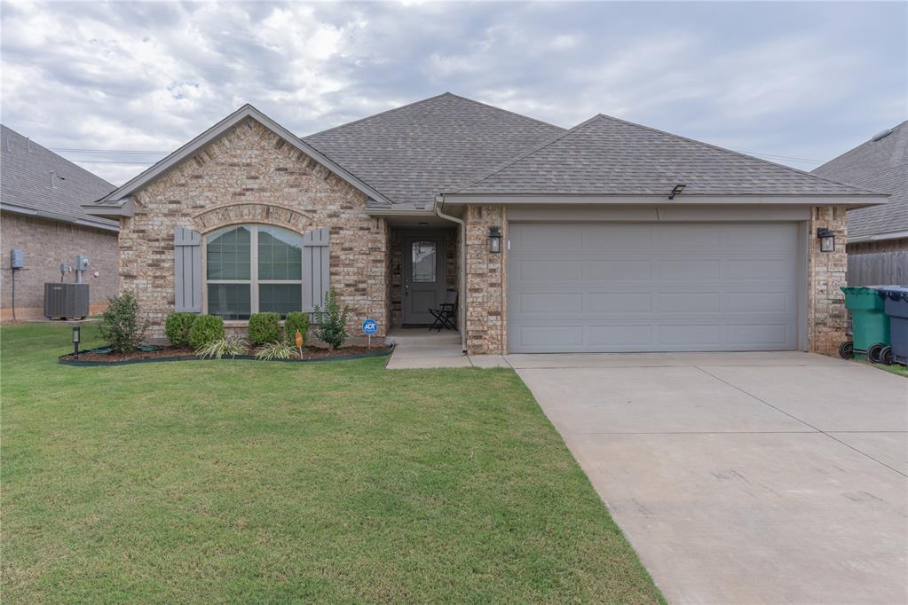 Welcome to this beautifully maintained 3-bedroom, 2-bathroom home in the desirable Lone Oak addition, offering a perfect blend of style and comfort. The home's impressive curb appeal is just the beginning. Step inside to an open-concept living area bathed in bright natural light from large windows, centered around a cozy corner gas fireplace with tiled surround. The spacious kitchen is a chef's delight, featuring a large center island with bar seating, elegant quartz countertops, and a trendy subway tiled backsplash. The primary suite is a true retreat with a spacious layout, trayed ceiling details, and a luxurious en-suite bathroom complete with a soaker tub, a newly tiled walk-in shower, and dual vanities. Outside, the fully fenced backyard offers a private sanctuary with a concrete patio area, perfect for relaxing or entertaining. Don't miss the chance to make this exceptional property your new home!