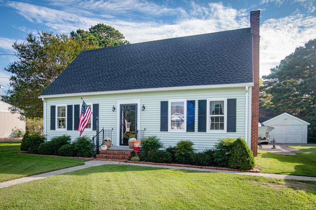 Well-maintained three bedroom, two full bath Cape Cod with a brand new roof and updated town-installed sewage system with public water. This home offers original hardwood floors and classic kitchen cabinetry, combining timeless charm with modern improvements. Spacious and inviting, it is ideal for raising a family or enjoying retirement. Located in town, you'll appreciate the convenience of nearby amenities along with easy access to both the Atlantic Ocean and the Chesapeake Bay, perfect for those who enjoy fishing, boating, or simply the coastal lifestyle. This property blends comfort, character, and practicality, making it an excellent opportunity for a full-time residence or vacation home.