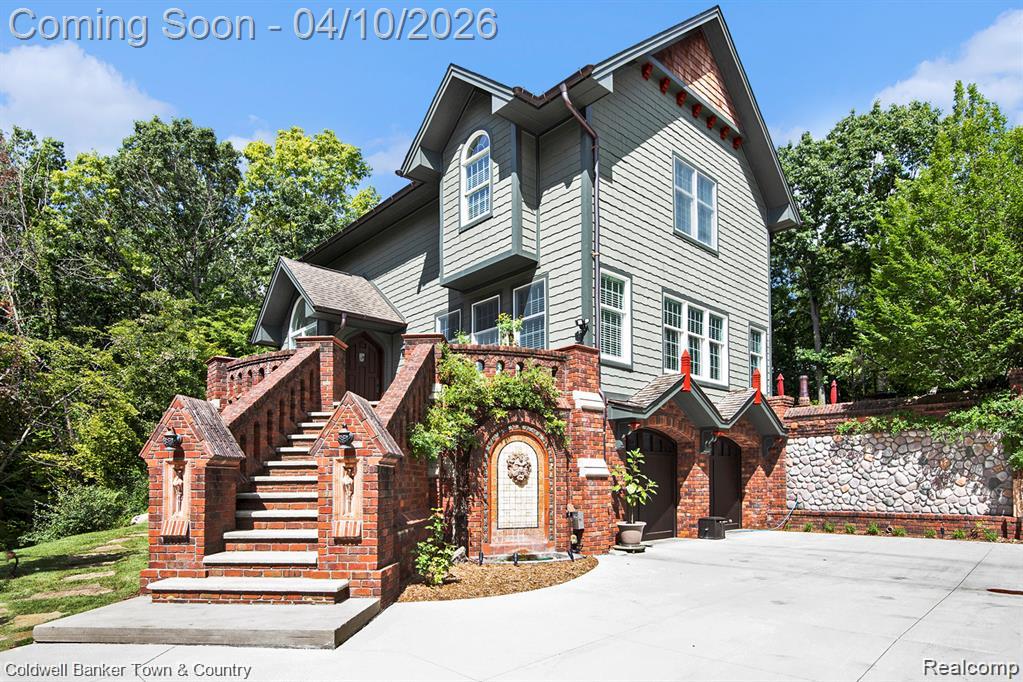 An enchanting, peaceful , wooded 5 acre estate located in Highland, MI with a Holly, MI address .This Home showcases the Fine Craftsmanship of English Inspired Architecture/Crown Moldings/Coffered Ceilings/Cherry cabinets/Antiqued Travertine  in Kitchen /  solid Walnut and custom ceramic flooring /Solid Walnut Gothic doors throughout/  4 bedrooms/ 3 1/2 Bath all custom ceramic wallsBoth Garage Door Openers replaced 2024 / Exterior and misc interior Painted 2023 / (2021) Water softener replaced (owned)/(2020) New driveway and upper driveway and motor court  greets you as you approach the English inspired architecture. Numerous Gothic features abound in the custom brickwork, patio fireplace and handmade ceramic decorative tiles.  Magical wall fountain with spitter (added 2018)  upon arrival into the motor court.  Once inside you’ll find natural antiqued 24x24” travertine pavers in the foyer and kitchen /2020 updates include… 3rd Bath ,Dog shower in garage, expansive landscaping , Ridgeline on Roof , A/C ,Tankless Hot water ,Gas Cooktop replaced \installed ,Natural GAS Installed from Street / (2019) New Maytag Washer & Dryer,  Man cave, she shed 1400 sq ft , Drywalled &heated (wood & baseboard) ,and Large attached Garden shed completed with Permit (2018) Generac Whole house Gen. ,Gothic fireplace in Living room , Copper Gutters & Spouts, Majority of Interior Painted / (2015) Roof Replaced  / Professional Maintenance in Last 6 months include,(Septic pump out , Ductwork Cleaning, Attic Inspection for critters,  Landscape with Mulch install $12,000 Resealed all Asphalt Drive)           This Pampered Home will Offer Years of Worry free living with the Current UpdatesAll on a Private Lane with 12 ,5 acres Parcels            see Docs for Sub Information