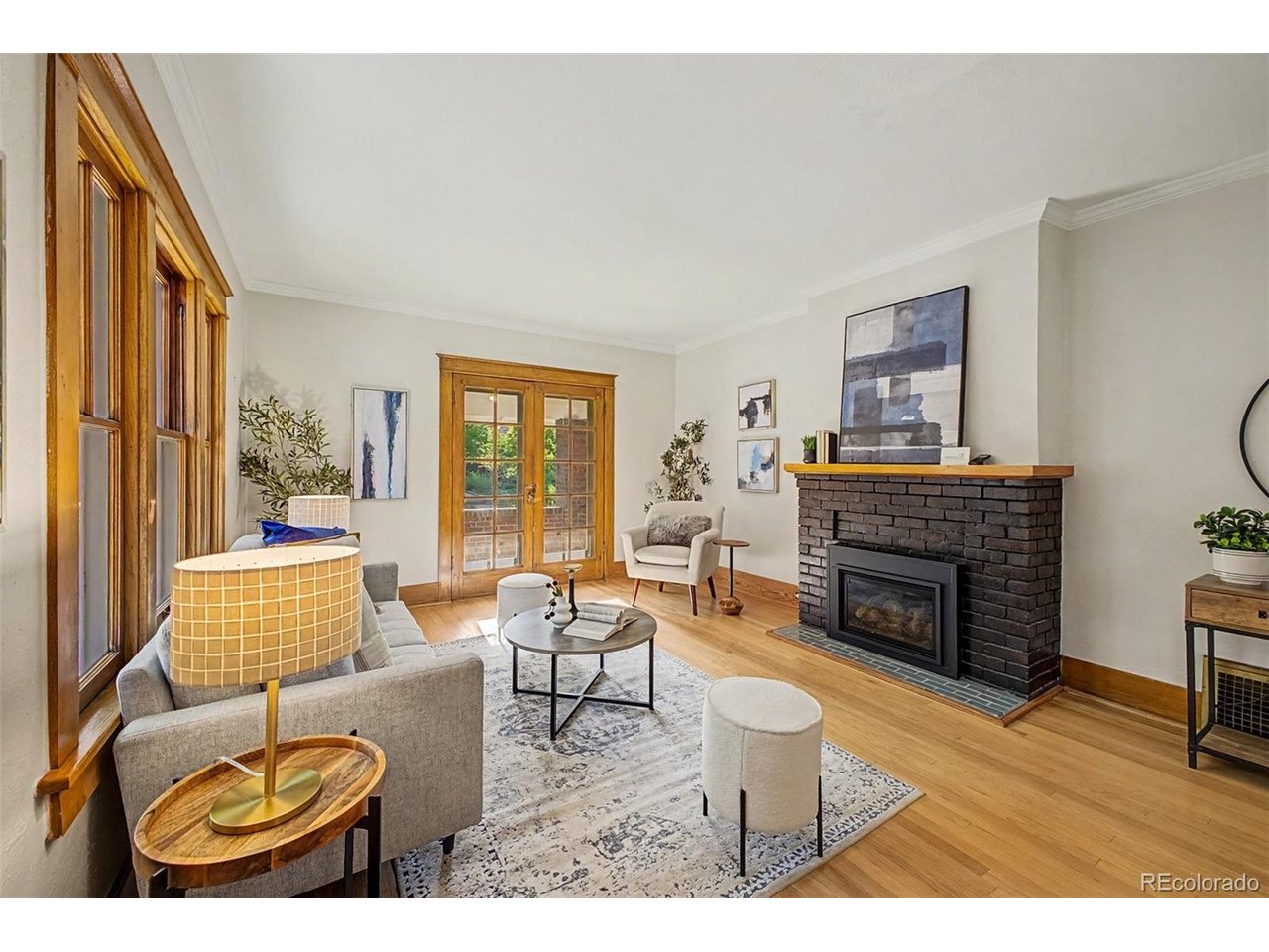 Welcome to this beautiful Congress Park home, tucked mid block on a tree lined street! Inside, you are greeted with a lovely living room with gas fireplace and dining room, 1bedroom and a 3/4 bathroom. The back of the home has a remodeled kitchen and bonus/TV room. The basement features a nicely sized bedroom and full bathroom, tons of storage and laundry room. Outside, the sunny private backyard is a great extension of this home, with a concrete patio for summer dining and entertaining! An oversized detached garage gives you plenty of storage for all your gear and car. Walking distance to Congress park and the new pool, playground,  Trader Joe's, AMC Theater, Coffee shops and restaurants at 9th & Colorado. A short distance to City Park, Denver Zoo, Cherry Creek Mall, Denver Botanical Gardens and so much more. This is the home you have been looking for!