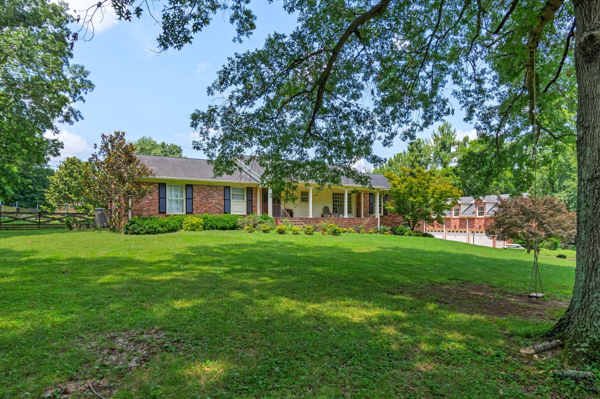 Tucked away on 5 flat, usable acres just off Neeley’s Bend, this all-brick ranch with a finished basement offers a rare blend of space, privacy, and opportunity. The main home features 4 bedrooms and 4 bathrooms, 2 car attached garage and a detached 3-car garage with an expansive 1,100 sq ft apartment or studio above—ideal for guests, rental income, music studio or office. 

Outside, you’ll find a barn equipped with electricity and water, beautiful oak trees complete with picturesque swing and plenty of room for your outdoor dreams—whether it’s a garden, animals, or simply enjoying the wild turkeys and deer that frequent the property.

The home has solid bones and a peaceful, picturesque setting, the potential is undeniable with a little vision. 

This is a rare opportunity to create your dream home or multigenerational estate in one of Madison’s most serene locations, 1 mile to Peeler Park. 
Peeler Park Greenway meanders through Peeler Park, a 636 acre pastoral park tucked away at the end of a curve in the Cumberland River known as Neely’s Bend. Its bucolic setting on the river features a greenway, primitive hiking trails, equestrian trails, and an airfield for remote-controlled planes.