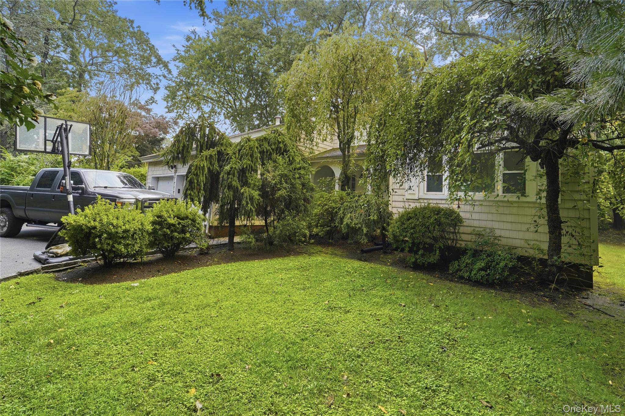Welcome to 33 Andover Road in Manor Woods, a wonderful 4 bedroom 2 1/2 bath property which offers a generous 2,325 square feet of living space, this inviting single-family home combines generous proportions, a versatile layout and a desirable Westchester location.  Located off of a cul-de-sac on a quiet tree lined property. This is your chance to own a beautiful contemporary home in the heart of Westchester.Set on approximately .21 acres, the property offers outdoor space for relaxing, entertaining, gardening or enjoying the seasons. Whether you're hosting summer gatherings or simply unwinding at the end of the day, the setting provides a wonderful extension of the home's living space.Located in Hartsdale with convenient access to shopping, restaurants, parks, major roadways and Metro-North transportation, 33 Andover Road offers the combination of space, convenience and Westchester living buyers are looking for.