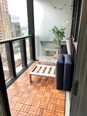 110 E Charles St 1204