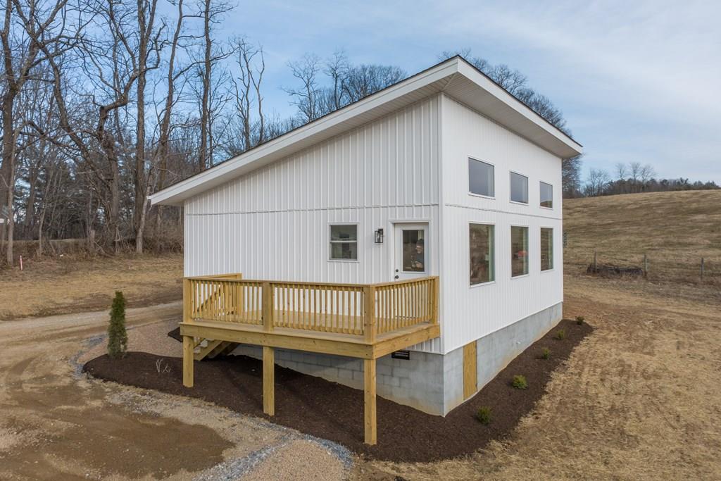 Brand new construction in a prime location between Floyd and Christiansburg, VA! Enjoy the perfect blend of convenience and country living in this Blue Ridge Mountain paradise. Situated on 4+ acres with state-maintained road frontage, this property offers beautiful views of rolling pasture and the surrounding mountains. Inside, you'll love the open floor plan designed for modern living and easy entertaining, with spacious living areas filled with natural light. Whether you're relaxing on the porch taking in the scenery or hosting family and friends, this home delivers comfort, style, and location all in one exceptional package.