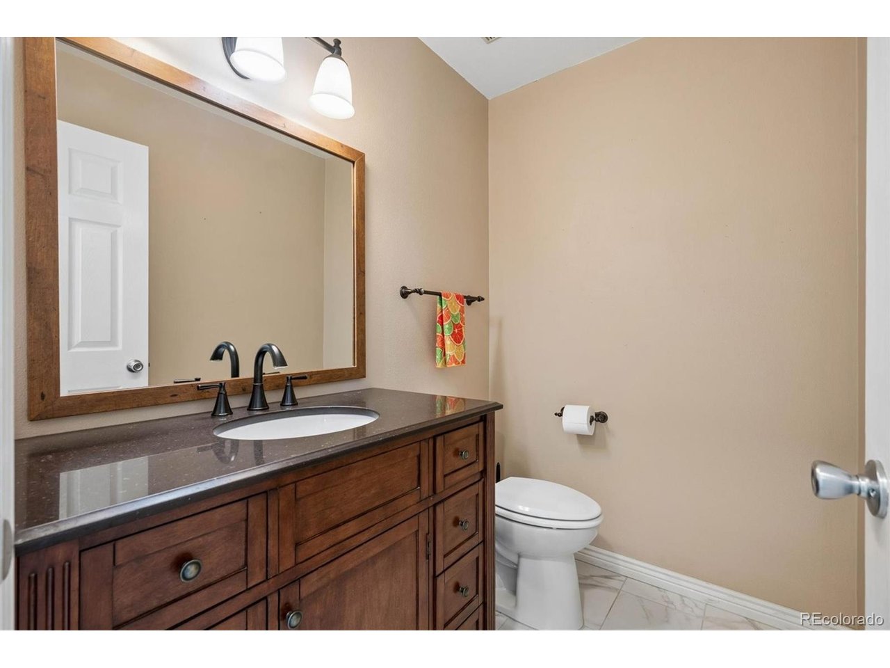 Gorgeous Remodel in Central Highlands Ranch, with a short walk to Rec center and Restaurants! Remodeled Kitchen with gas range and upgraded cabinets with slide outs and extras, plus a second sink!  Beautiful primary suite with vaulted ceilings and walk in closet, second closet and the Primary Bath remodeled 3/2026, Brand new carpet in basement, New upgraded roof in 2021, New exterior paint 2022, fences redone improved in 2023, new attic insulation 2022, new windows in 2016, beautiful laminate floors! Ceiling fans in the bedrooms, Tile bathrooms, extra storage with shelving in the finished basement. 2 sliding doors to the great yard with garden area and large patio!