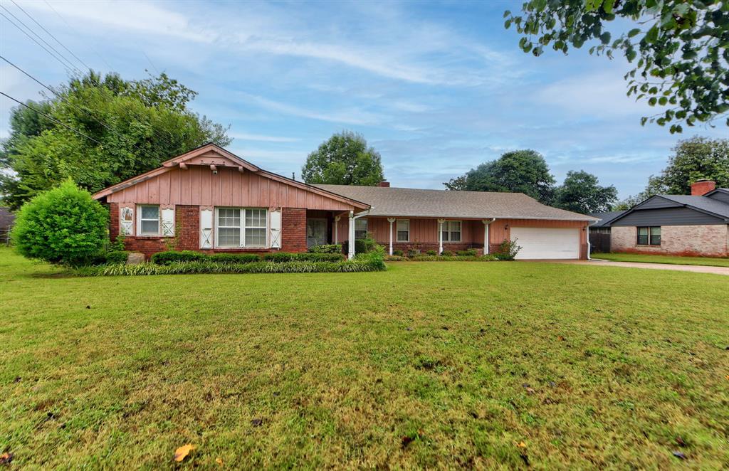 Great house in beautiful highly desired Cashions Wildewood. Convenient to major highways. Ranch style, one -level with large heated and cooled sunroom with built in Saferoom, lofty ceiling with plenty natural light Brick fireplace and molding. Full house generator. Large back yard. Walk-in bath tub in master. Two lazy susans in the kitchen. Hardwood floor under carpet in den. This house include an intercom system and a yard sprinkler. New roof in August 2025. New air conditioning compressor in August. Custom cedar stock aide fence. This one needs some updating but has great potential. Over sized garage. Seller willing to negotiate. Make this your forever home.