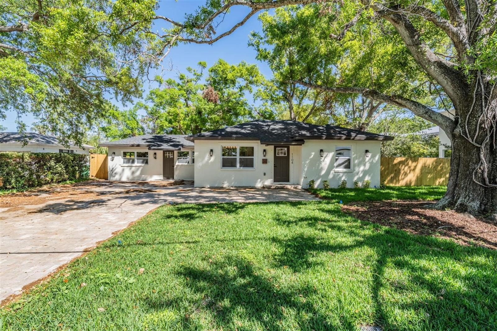 PRICED TO SELL! APPRAISED ABOVE LIST PRICE - Excellent opportunity to own a South Tampa Gem and walk into INSTANT EQUITY – Fully Remodeled & Zoned for Top A-Rated Schools! 

Welcome to 1104 S Lois Avenue, this is not your typical 1950's South Tampa home. This beautifully remodeled gem is nestled in the highly sought-after Grady, Coleman, and Plant school district. This LIKE-NEW HOME has been completely transformed from the studs and has been meticulously reconstructed with high-quality materials and craftsmanship complete wiith modern upgrades and timeless charm, making it truly move-in ready for its next owner!

Every detail has been thoughtfully updated, including a BRAND NEW ROOF (2024), NEW ELECTRICAL AND PLUMBING (from the house to the street 2024), new doors, new high impact windows, new stucco, new water heater, new front irrigation system, new custom three point turn driveway, new lights and high sensitivity motion lights new, brand-new luxury flooring throughout, and brand-new premier appliances, including a double-zone beverage craft refrigerator that makes two types of ice! With 3 bedrooms, 2 bathrooms, and 1,599 sqft, this home offers both elegant style and functionality.

Step inside to a warm and inviting interior, where a spacious living area provides the perfect setting for relaxing or entertaining. The chef’s kitchen boasts brand new stainless steel appliances, wine refrigerator, air fryer in the stove, and ample cabinetry, ensuring a seamless cooking experience. The primary suite serves as a private retreat, while the additional bedrooms offer flexibility for guests, family, or a home office. The bathrooms feature Bluetooth fog-free mirrors that play music, adding a luxurious and high-tech touch.

Beyond the beautifully updated interior, this home sits on AN OVERSIZED LOT (over 1/5 of an acre) which is few and far between in South Tampa providing endless potential, whether you dream of adding a POOL, an accessory dwelling unit (ADU), or creating your own private outdoor oasis. The backyard slab is perfect for a fire pit pad and FULLY FENCED IN, creating a cozy space for gatherings and maximizing privacy. 

Located in a non-flood zone, this property has had no water intrusion, flooding, or damage from recent storms. Plus, its prime location puts you just minutes from Bayshore Boulevard, Tampa International Airport, downtown, Channelside, Hyde Park Village, and the Tampa Riverwalk, offering the best of South Tampa’s shopping, dining, and entertainment.

Don’t miss your chance to own this exceptional home in one of Tampa’s most desirable neighborhoods. Schedule your private showing today!