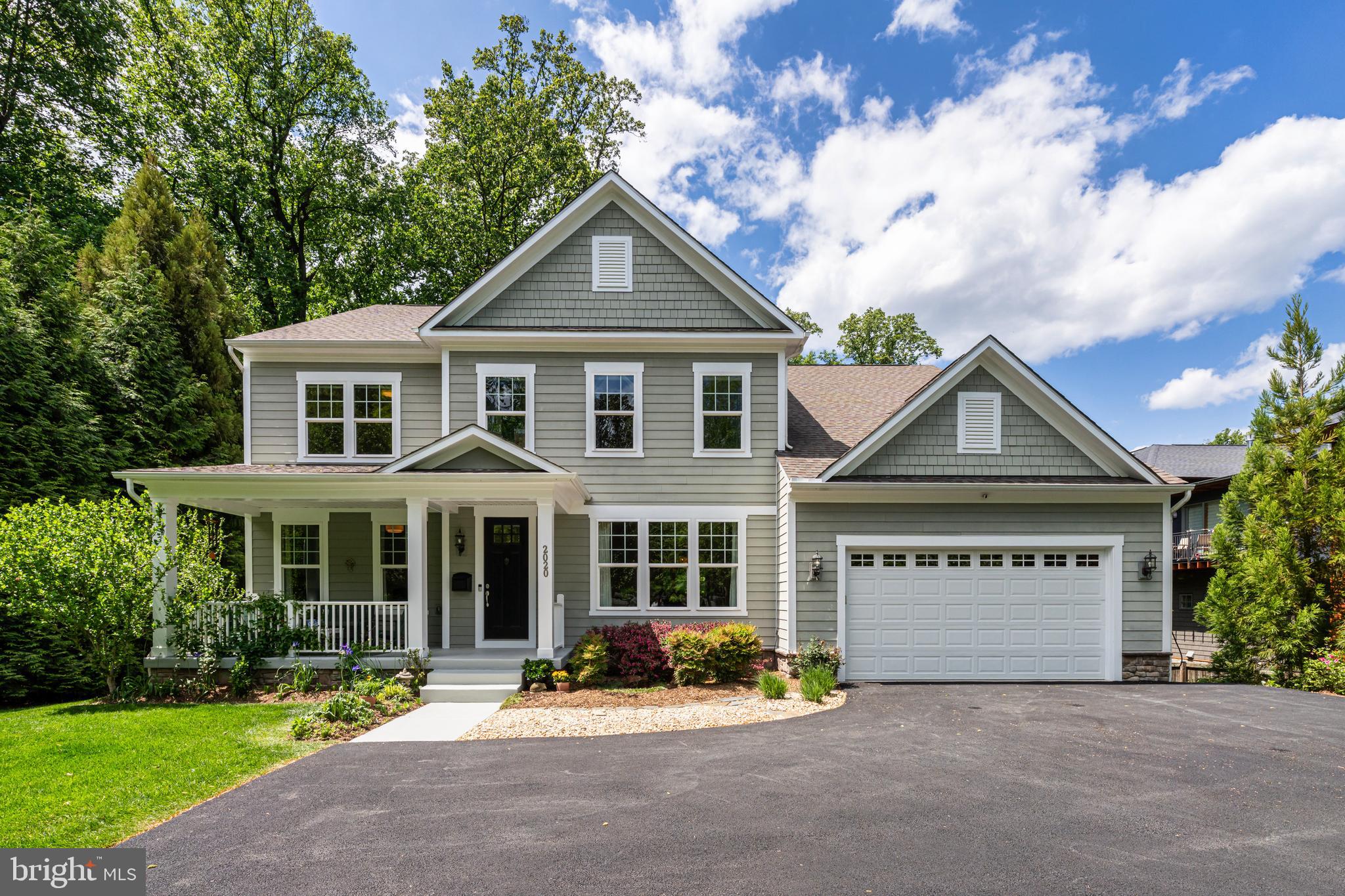 A Private Urban Retreat in the Heart of Franklin Park.Sited on a flat, east-facing .69-acre lot in Franklin Park—one of McLean’s most desirable close-in neighborhoods—this exceptional property offers a rare combination of space, privacy, and gracious comfort. Surrounded by mature landscaping and specimen trees, this home is a private sanctuary just moments from city life. Built in 2015, this five-bedroom, four-and-a-half-bath residence welcomes you with sunlit interiors, nine-foot ceilings on all three levels, and Armstrong Prime Harvest Oak flooring throughout. The chef’s kitchen features Cambria quartz countertops, custom cabinetry, and premium stainless steel appliances, including double wall ovens and dual dishwashers. A vaulted sunroom and screened porch open to a deck with stairs leading to flagstone patios, a fire pit, and an expansive grassy backyard—ideal for entertaining, play, or quiet relaxation in the natural surroundings. Upstairs, the spacious primary suite offers a serene retreat with tray ceiling, a generously sized custom walk-in closet and spa-style bath featuring dual vanities, a soaking tub, and a walk-in shower with seamless glass door and rainfall head. Three additional bedrooms—each with blackout shades and generous closets—provide comfort and flexibility. The walkout lower level with full light includes a large recreation room, fitness space, guest suite with full bathroom, and access to the lower flagstone patio and gorgeous private backyard with mature landscaping and nature at your fingertips. Built with enduring quality, the home features steel I-beam construction, a 30-year shingle roof, dual HVAC zones, and two new 50-gallon water heaters (2025). A main-level two-car garage adds everyday convenience, while smart home integrations for lighting, irrigation, HVAC, and security—plus a Level 2 EV charger—deliver modern ease and efficiency. Enjoy nearby Chesterbrook Shopping Center, Linway Terrace Park, and Chesterbrook Swim & Tennis Club, with convenient access to Arlington, Washington, D.C., Tysons, and major commuter routes including Chain Bridge, the GW Parkway, I-66, and I-495. Franklin Park is beloved for its urban forest setting—a community where nature, privacy, and convenience coexist beautifully.