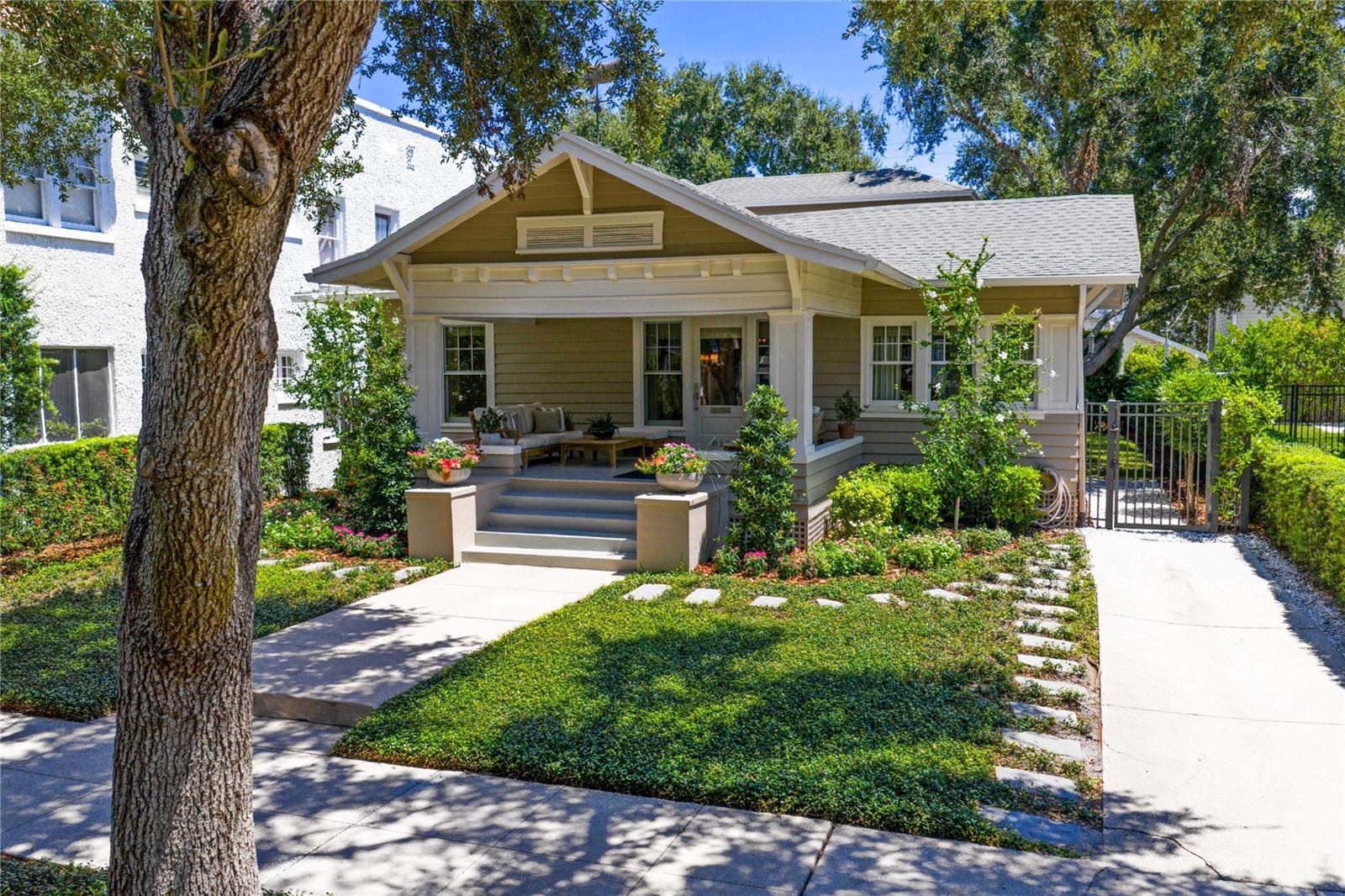 This one of a kind home in Hyde Park's Golden Triangle is where Hyde Park meets the Hamptons, a sophisticated residence all about the details and is a true masterpiece in design. Bleached wide plank wood flooring can be found on both levels of the bungalow, along with wonderful woven shades and custom blackout draperies. The 8 inch moldings and antique mirror accents add an extra layer to the interior envelope. Upon entering from the large front porch is an open central foyer. A light and bright sunroom, with windows on 3 sides, can be found to the right and to the left in the front living area. The kitchen has custom cabinetry with an abundance of storage options, completed by a Dacor gas range, Sub-Zero refrigeration, dishwasher drawer and banquette dining. Thick Carrara marble counters finish off the package. This area seamlessly flows into the large back living area with French doors to the outdoor conversation deck and backyard. The downstairs master suite is an oasis, with walk-in closet and dressing area leading to the master bath.  Custom cabinetry and thick marble counters can also be found here, with soaking tub, a light filled seamless glass shower and make-up area.  The details give it a spa like quality. There is also a beautiful jewel box powder room on this floor.  The second floor is its own private guest suite, finished off to perfection like the first floor. A landing foyer leads to three areas on this level, bedroom, walk-in closet and large full bath. The bedroom has a treehouse appeal. The bath has a seamless glass shower, large custom vanity and mirror details. An easy access first floor attic is climate controlled and offers great storage. This home also sits on one of the highest parts of Hyde Park and has never flooded. These are just a few of the details and one of a kind options this home has to offer. Make an appointment to see this jewel box in Hyde park !!