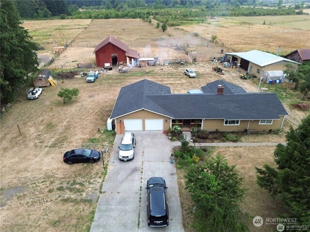 Wow, what a bargain. Beautiful one level home plus a barn and outbuildings sits on 4.7 acres (TWO parcels)  Spacious home, patios and large yard with room to grow and expand.  Possible ADU to build buyer to verify with County.  Additional 18 acres available.