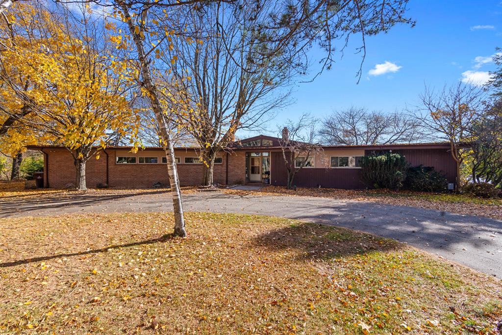 Welcome to this stunning 3,500 SQFT home set on 2.54 secluded acres with a circular driveway. The spacious living room features a beautiful brick-surround fireplace and floor-to-ceiling windows that fill the space with natural light. The kitchen offers ample cabinet and counter space along with a cozy breakfast nook. A convenient first-floor laundry rounds out the main level. Upstairs, you'll find three bedrooms, including the primary suite with double closets and door wall access to an L-shaped sunroom - perfect for relaxing and taking in the peaceful views of Pine River. The hallway also includes built-in shelving for added storage. The walk-out basement provides additional living space with a bar area, full bathroom, and plenty of room for recreation or storage. Outside, enjoy a large patio that overlooks the scenic Pine River. Additional highlights include a food elevator (dumbwaiter system), new chandeliers, a 2.5 car attached garage, and a furnace that's approximately one yearone year old. Schedule a showing today! All tenants 18+ must complete an application ($35 fee per applicant). Security deposit is 1.5 times the monthly rent. TTVAI. ; Price Term: Per Month; Lease Term/Renewal: COM AT E 1/4 COR, TH N 373.3 FT, S 74 DEG 10' 55'' W 690.24 FT, S 311.82 FT, E 254.17 FT, NE'LY TO A PT ON E & W 1/4 LINE THAT IS 385.34 FT W OF POB, TH E TO POB, & ALL THAT PART OF N 1/2 OF NE 1/4 OF SE 1/4 OF SEC 5 LYING & BEING S & E OF PINE RIVER, & ALSO ALL THAT PART OF S 1/2 OF SE 1/4 OE NE 1/4, LYING E OF PINE RIVER, SEC 5-11-3.