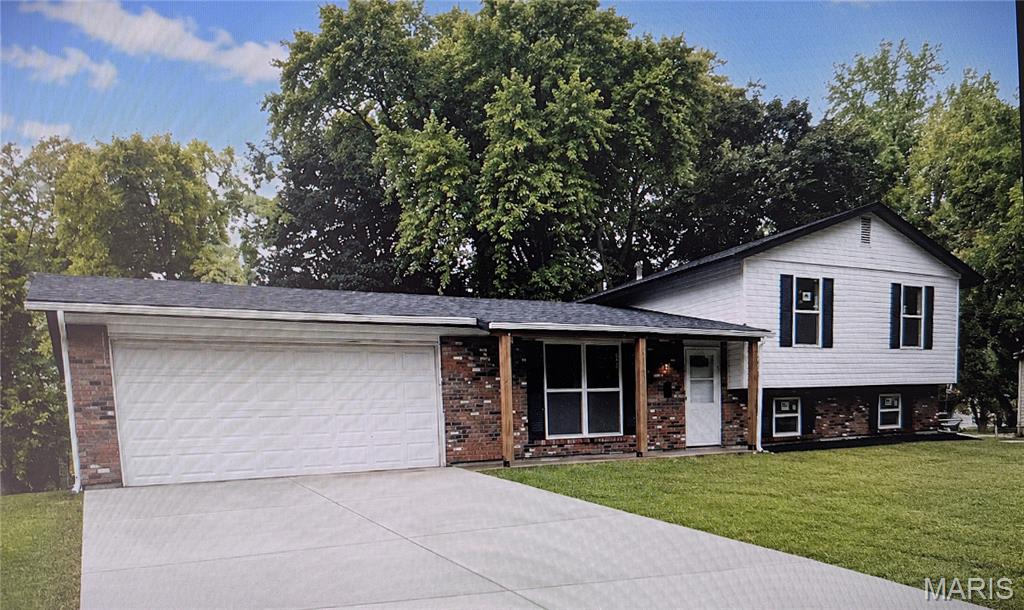 Completely renovated and given new life from top to bottom, this move-in-ready home offers the feel of a fresh start with extensive updates inside and out. The exterior has been transformed with new siding, new windows, a new roof with all-new sheathing, a new driveway and new patio, creating strong curb appeal and eliminating many of the big-ticket projects buyers often worry about.Inside, you’ll find new flooring, fresh paint, updated lighting and modern finishes throughout. The all-new kitchen features white shaker-style cabinetry, butcher block countertops, stainless steel appliances and a clean, functional design that flows naturally into the living areas.Both full bathrooms on the main level have been completely updated, and an additional full bathroom was added on the lower level, bringing the home to three full bathrooms. The finished lower level provides valuable additional living space that can be used for entertaining, recreation, a home office, guest area or a combination of uses.The renovation went well beyond cosmetic finishes. New drain tile and a new sump pump were installed, and the City of St. Peters recently repaired the sewer lateral line. The HVAC system is approximately six years old and has a new fan motor.The fireplace provides a great architectural focal point and is for decorative purposes only; it is not operational.From the roof, siding, windows, driveway and patio to the kitchen, bathrooms, lower level and drainage improvements, this home has been thoughtfully updated with both appearance and function in mind. A tremendous amount of work has gone into giving this home a whole new life—ready for its next owner to move in and enjoy.