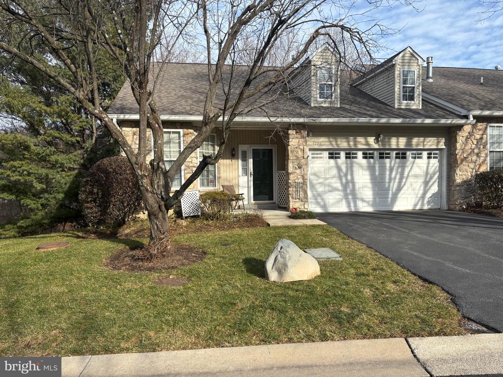 Located in the desirable Golfview Estates 55+ community, this beautifully maintained corner-lot home offers carefree living and first-floor convenience.This 2-bedroom, 2.5-bath property welcomes you into a spacious foyer with access to a coat closet and the attached 2 car garage.The bright eat-in kitchen features a charming bay window, white cabinetry, tile backsplash, granite countertops, and a stainless steel dishwasher. The adjacent dining room offers ample space for entertaining.The open and light-filled living room provides a comfortable gathering space and leads directly to the deck—perfect for relaxing or enjoying the outdoors. The spacious primary bedroom is one of two bedrooms on the main level and features a private ensuite bath and a walk-in closet. The second bedroom, a hall bath, and a convenient laundry room complete the first floor. The finished basement , with new carpeting,  offers a powder room , walk-out to the patio and a generous living area that can be customized to suit your needs.