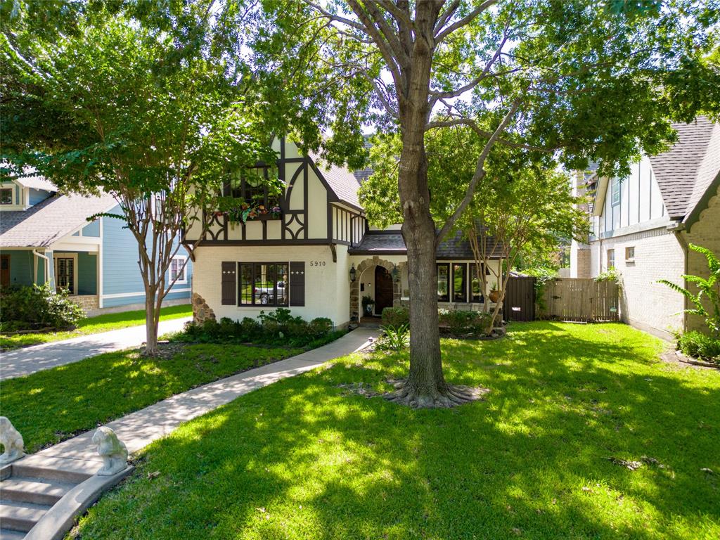 Custom-built by English Heritage Homes, this residence showcases timeless design, superior craftsmanship, and thoughtful updates. Elevated ceilings, expansive windows, and gleaming hardwood floors fill the home with light and warmth. The chefs kitchen boasts honed marble countertops, Viking appliances, a spacious storage island, and freshly painted finishes that flow seamlessly into the living area. Windows capture views of the covered patio, heated pool, and two-car garage with built-in shelving, while dual covered porches extend the living space outdoors. The primary suite is a serene retreat with a sitting area, private balcony, and spa-like marble bath featuring a clawfoot tub, dual vanities, and separate shower. Recent upgrades include freshly painted kitchen and living areas, two new water heaters with circulation pump for instant hot water, resurfaced pool, new automatic gate operator, stamped concrete patio, and new pool equipment for year-round peace of mind. Solid wood doors, honed marble countertops, marble tile, and hardwood floors showcase timeless quality and sophistication. Just around the corner from the new Geneva Heights Elementary and Tietze Park, this home offers charm and convenience in a walkable East Dallas neighborhood near Greenville Avenue, Lakewood Shopping Center, and White Rock Lake. Move-in ready, this home blends classic elegance with modern comfort in a premier location.