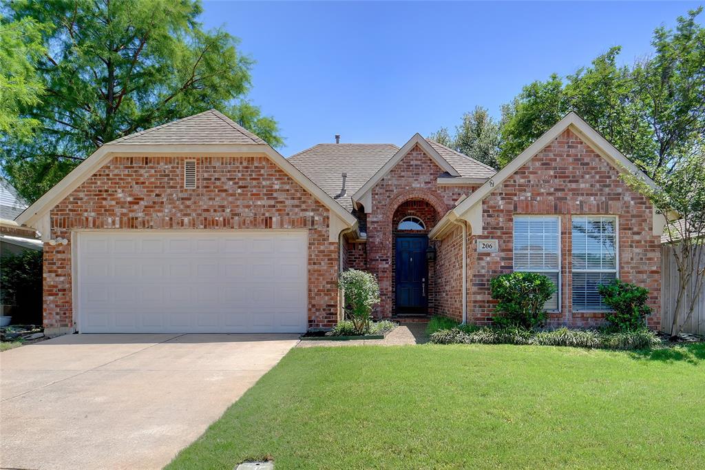 Welcome home to this spacious 3-bedroom, 2-bath retreat nestled in a quiet HOA neighborhood. Upon entry, you'll be greeted by a vaulted ceiling that accentuates the airy feel of the home. The master bath boasts a luxurious garden tub, separate shower, his and her sinks, a walk-in closet, and a linen closet for added storage convenience. The kitchen is a chef's delight with a breakfast bar, island, and a blend of wood, tile, and luxury vinyl flooring throughout. Enjoy cozy evenings by the gas fireplace in the expansive living room or step outside to unwind on the covered patio overlooking your private yard. Residents will appreciate community perks such as a pool and clubhouse, perfect for social gatherings. Conveniently located near major highways 183, 121, and 360, this home offers easy access to DFW Airport and a seamless commute to Downtown Dallas or Fort Worth. Don't miss out on this opportunity to call this meticulously maintained property your new home!