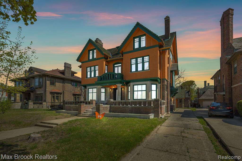 Welcome to this 1913-built, Tudor-inspired, 6-bedroom home on 0.31 acres—known as the Albert J. Dunneback House. Located in Detroit’s prestigious Arden Park–East Boston Historic District, this neighborhood is renowned for its grand early-20th-century estates built during Detroit’s industrial boom—once home to auto pioneers like John Dodge and J.L. Hudson.

Blending timeless character with modern convenience, the home offers gracious living spaces suited for both intimate gatherings and grand entertaining. Upon entry, you're welcomed by original hardwood flooring that continues throughout the entire residence. The main level features both original and updated fireplaces in the living and family rooms—ideal for fireside chats, a home office, or memory-making moments.

A spacious dining room and adjoining sunroom provide additional areas for hosting and everyday enjoyment. The kitchen has been updated with new granite countertops, while the bathrooms shine with crisp white marble and tile. Historic charm remains in details like the preserved stairwell and trim, while contemporary finishes and fresh paint bring new life to each space.

The second and third floors offer a peaceful retreat, featuring six bedrooms, three full baths, and another sunroom perfect for a morning breakfast nook. The full basement provides generous storage and includes a built-in safe room with its original 1913 door.

Outside, the iconic green terracotta roof tiles have been meticulously refurbished to match the original design—a rare and defining feature of this historic home.

All this, just minutes from downtown Detroit’s renowned dining, theaters, and cultural venues. With ample space and one-of-a-kind character, this home offers the opportunity to create your own legacy. Make this Southeast Michigan estate a lasting part of yours.