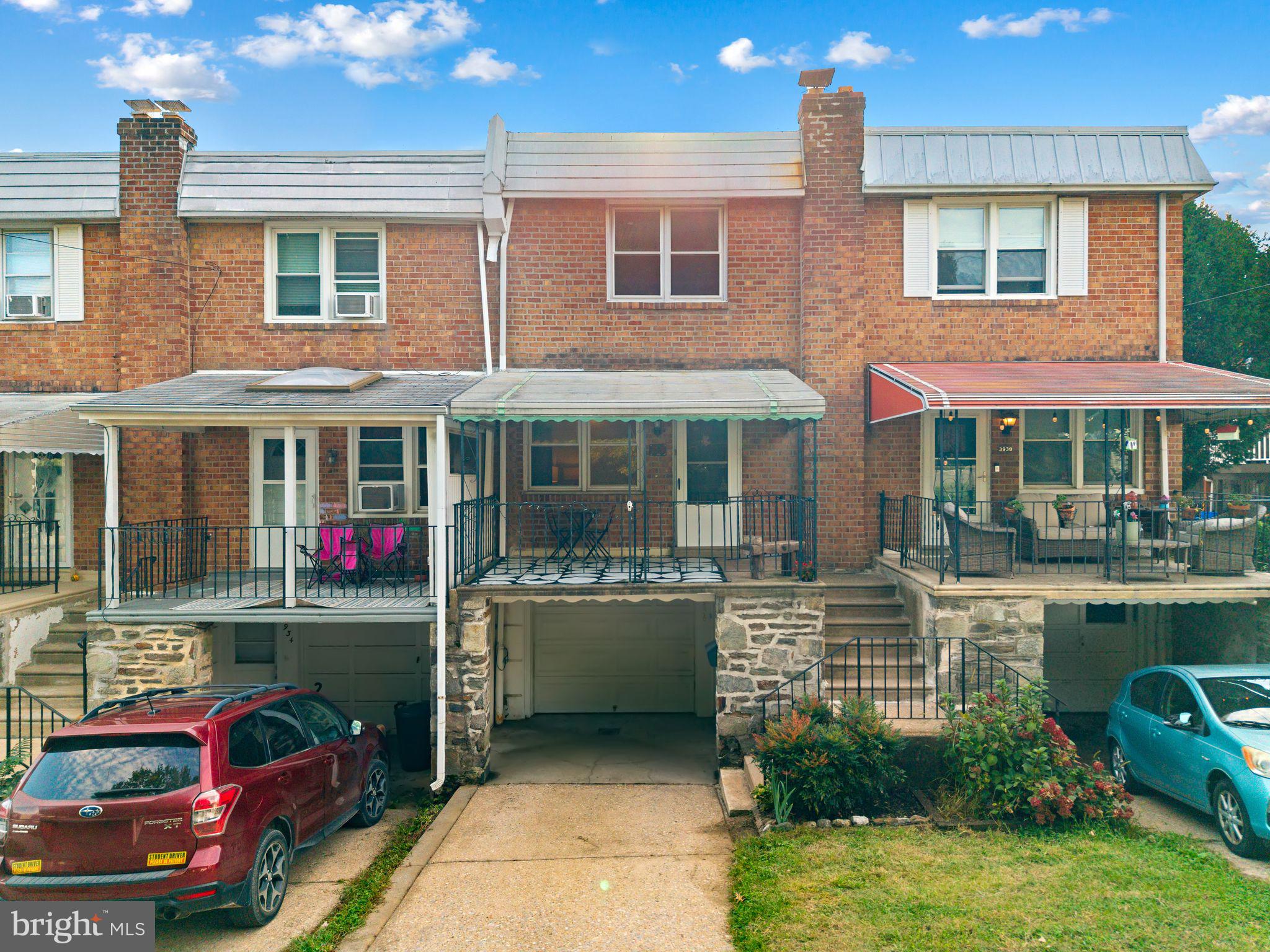 An inviting front porch, a thoughtfully updated kitchen, and the everyday convenience of garage and driveway parking: 3936 Mitchell Street brings together plenty to love in Manayunk/Roxborough.Inside, hardwood floors carry through the living and dining rooms, creating a warm setting for quiet evenings and a full table of friends. The kitchen pairs soft green cabinetry with brass-toned hardware, stainless steel appliances, a subway tile backsplash, and recessed lighting. It’s a fresh, cohesive space with a little personality, complemented by access to the fenced backyard for outdoor dining, gardening, or simply enjoying some fresh air.Upstairs, three bedrooms offer hardwood floors and closet space, alongside a full hall bathroom. The finished basement adds flexible room for a home office, workout area, or second living space, with a convenient half bath, laundry, and access to the attached garage. Central air rounds out the home’s practical comforts.Out front, the covered porch offers a welcoming spot to settle in with your morning coffee. Beyond the front door, enjoy just a 10-minute walk to Wissahickon Park & Forbidden Drive, and close proximity to C & C Creamery, Ridge Avenue’s neighborhood businesses, Main Street Manayunk’s shops and restaurants, and nearby public transportation.With useful space inside and out, thoughtful updates, and parking already accounted for, this is a home that makes everyday Philadelphia living a little easier.