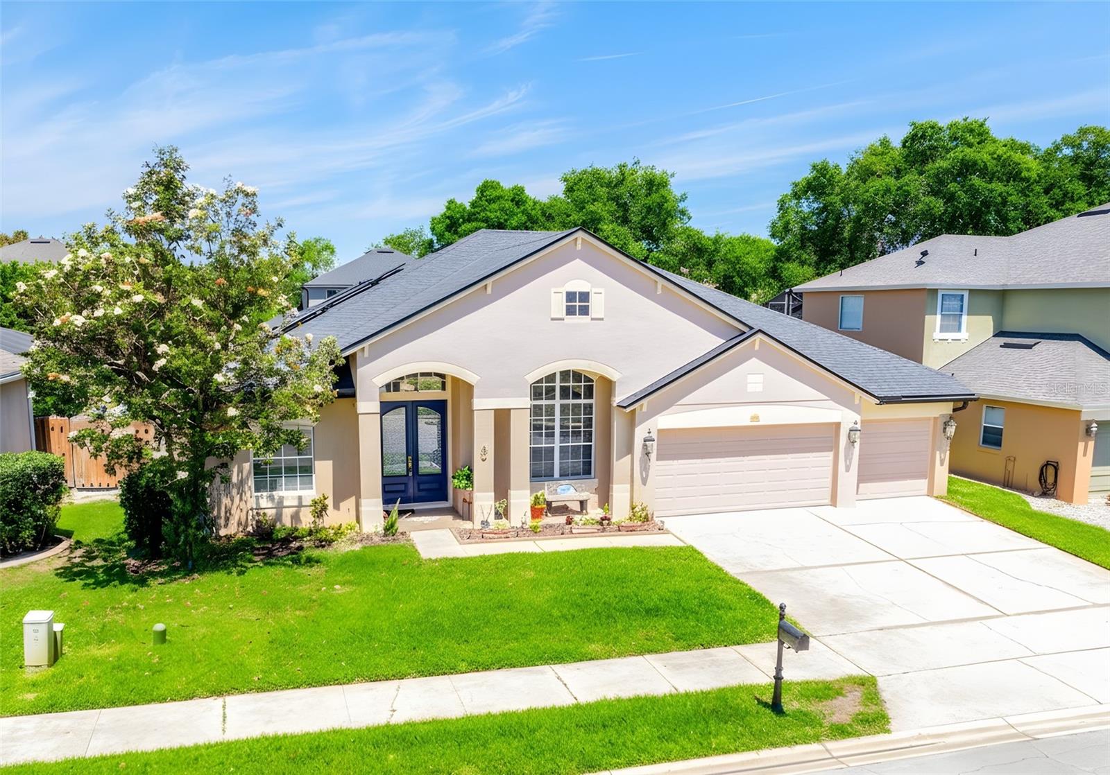 One or more photo(s) has been virtually staged. Set within the sought-after gated community of Tuscany at Lake Mary, this well maintained SINGLE STORY ~ POOL HOME combines smart updates, a functional layout, and a prime Lake Mary location! Recent improvements include a WATER SOFTENER SYSTEM (2025), assumable SOLAR PANELS (2021) to help keep energy costs low, EXTERIOR PAINT (2021), and a NEWER ROOF (2020), along with a generator connection already in place for added peace of mind. Designed for both everyday living and entertaining, this home features a SPLIT BEDROOM FLOOR PLAN with a seamless flow between formal living and dining spaces and a generous family room. The open concept kitchen is the heart of the home, offering 42” cabinetry, STAINLESS STEEL APPLIANCES, pantry storage, a prep ISLAND, and breakfast bar seating – all overlooking a light-filled breakfast nook and your private SCREENED POOL. Your oversized PRIMARY SUITE is tucked away at the back of the home for added privacy with direct lanai access and a spacious en-suite bath complete with a dual sink vanity, soaking tub set beneath a large window, separate glass-enclosed shower, and a large 8x12 WALK-IN CLOSET. Secondary bedrooms are thoughtfully positioned on the opposite side of the home, with two sharing a Jack & Jill bath and a fourth bedroom conveniently located near a full/pool bath – ideal for guests or multi-generational living. A dedicated FLEX/OFFICE behind double doors at the front of the home adds flexibility for remote work, study or a lounge space. Step outside to your personal Florida retreat featuring a screened pool with a STACKED STONE WATERFALL, a large COVERED LANAI, and plenty of space to relax or host weekend gatherings. Additionally, the 3-CAR GARAGE provides ample room for parking and storage. Residents of Tuscany at Lake Mary enjoy a GATED ENTRANCE and a community pond with DOCK for fishing or enjoying the view, all within close proximity to TOP-RATED SCHOOLS, shopping, dining, and major roadways including 417 and I-4. You are also just a short drive to Lake Monroe and the Central Florida Zoo & Botanical Gardens, making this location as convenient as it is desirable. With 4 bedrooms, 3 full baths, a dedicated office, and versatile living spaces throughout, this home offers the perfect combination of great floor plan and great location in one of Lake Mary’s most premier communities. Call today to schedule a tour and fall in love with Via Russo Lane!